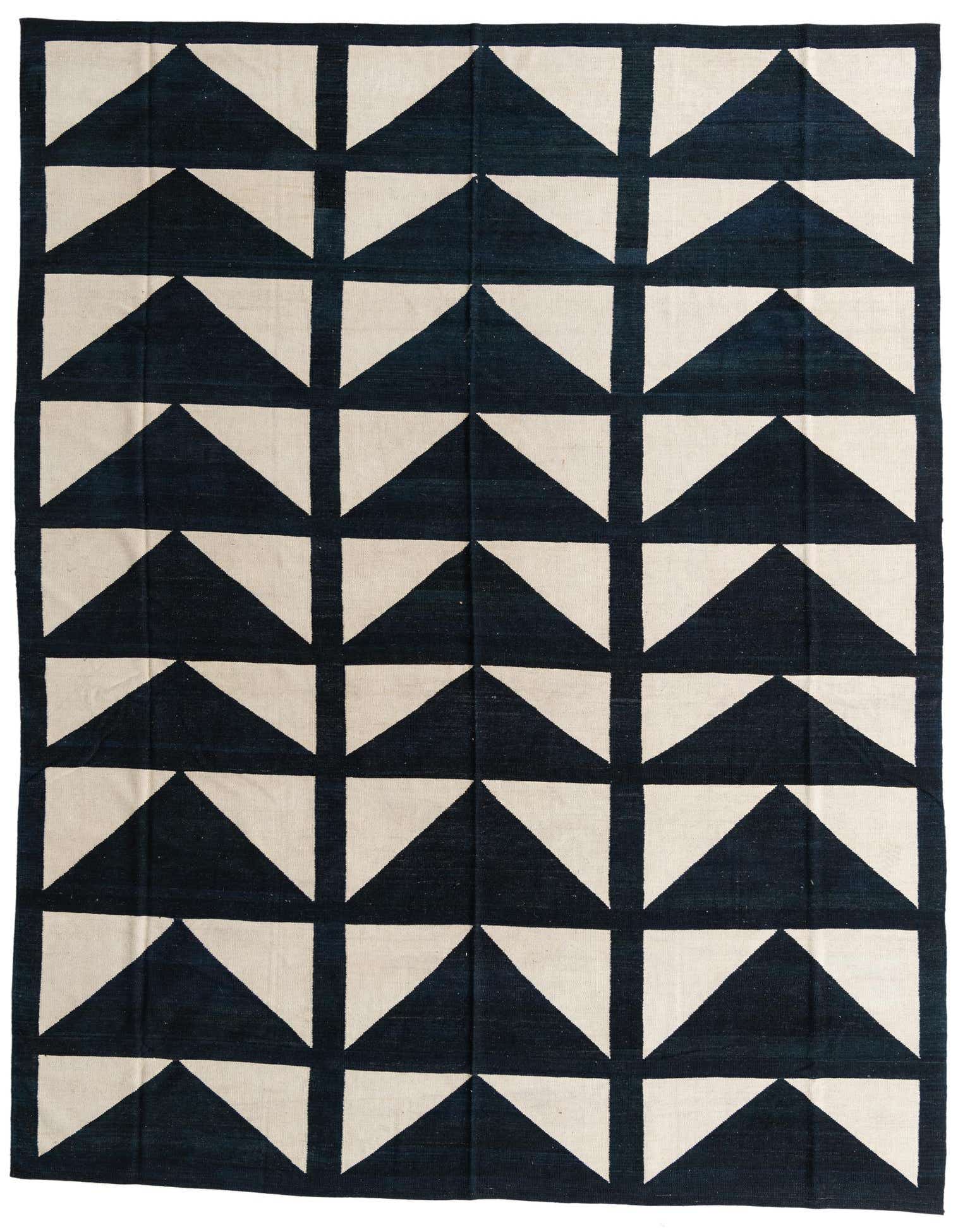 A 10x13 rectangular black and off-white flatweave rug with a modern tribal geometric triangle pattern, suitable for a living room.