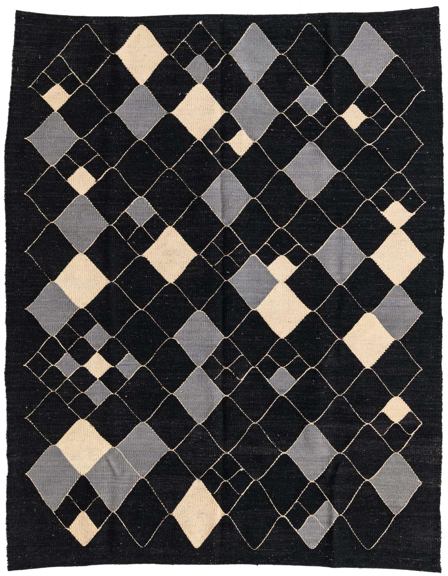 A 5x8 rectangular black flatweave rug with a modern tribal pattern of light gray and cream diamonds.