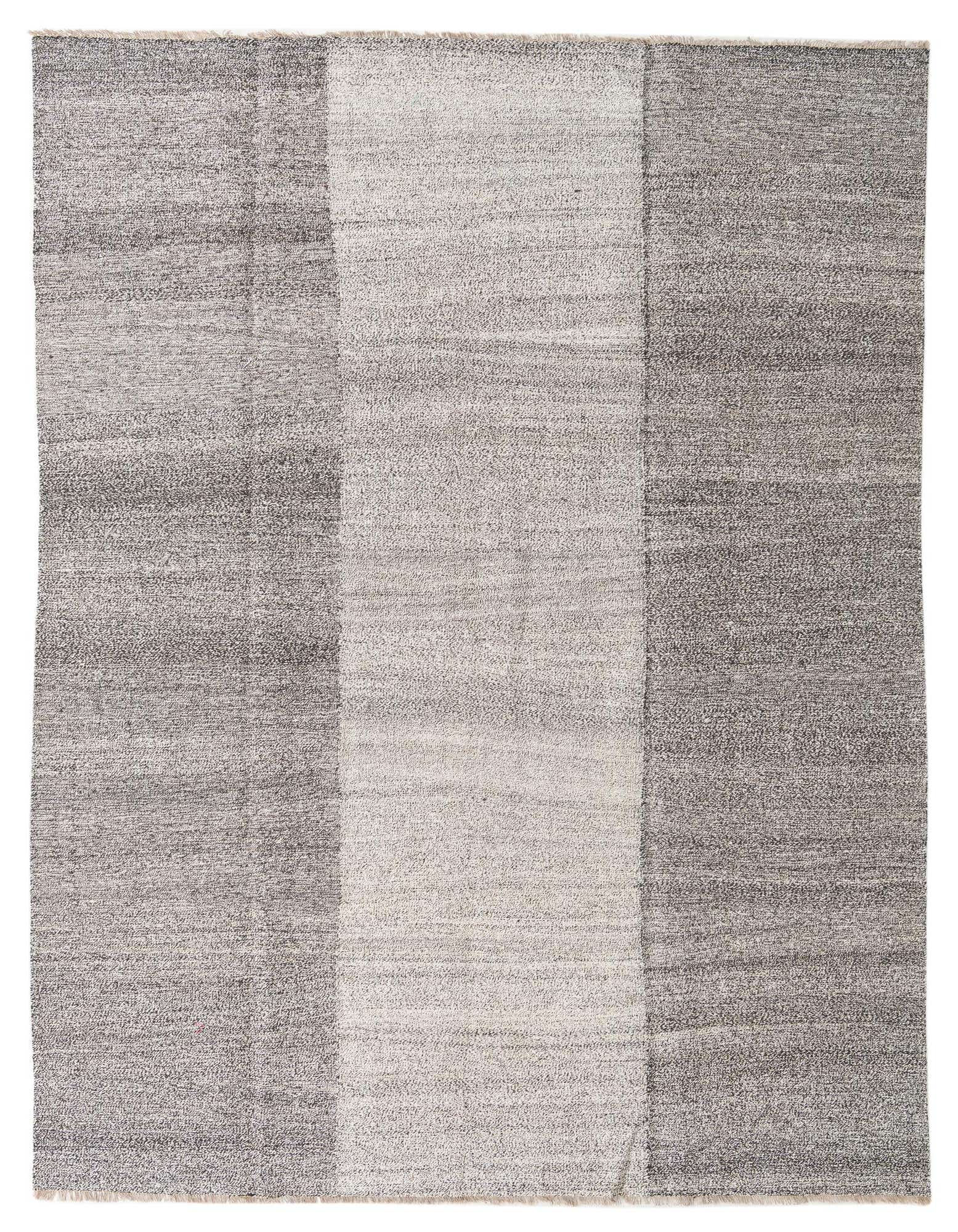 A rectangular 8x10 Kilim Modern wool rug featuring a striking abstract pattern of varying black and gray shades.