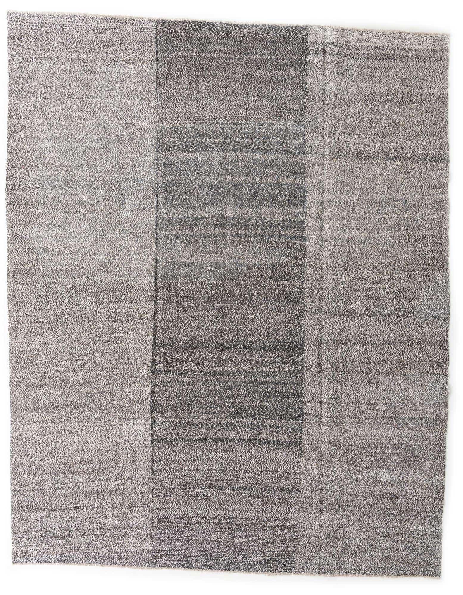 A 10x12 rectangular Kilim Modern wool rug featuring a blend of black and gray tones in a tribal, abstract pattern.