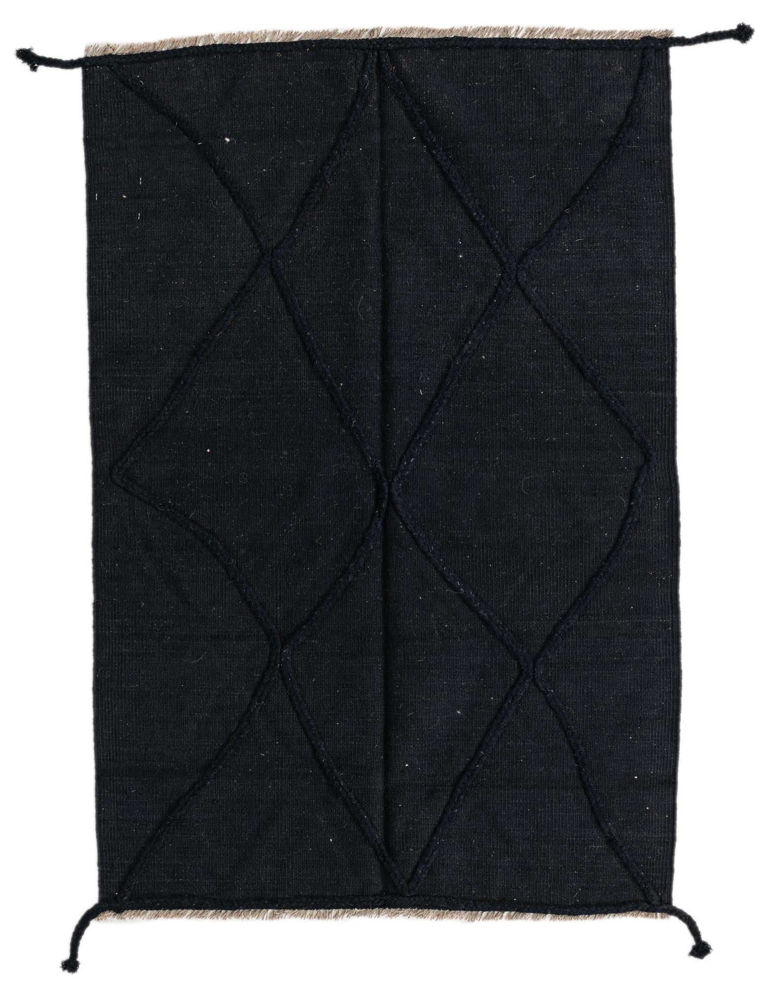 A 3x5 rectangular black flatweave wool rug with a subtle tribal diamond pattern, ideal for an entryway.