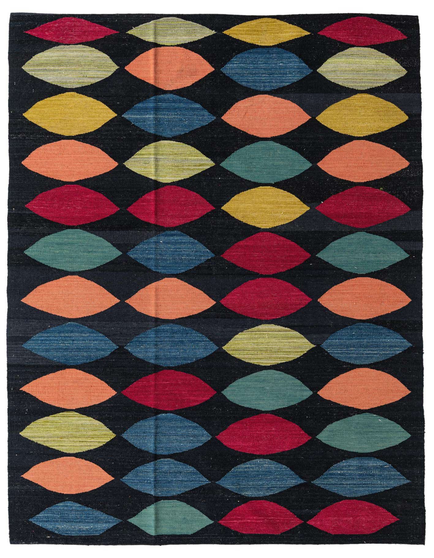 A 5x8 rectangular Kilim Modern rug with a black background and a vibrant pattern of colorful, eye-shaped motifs in red, orange, yellow, and blue.
