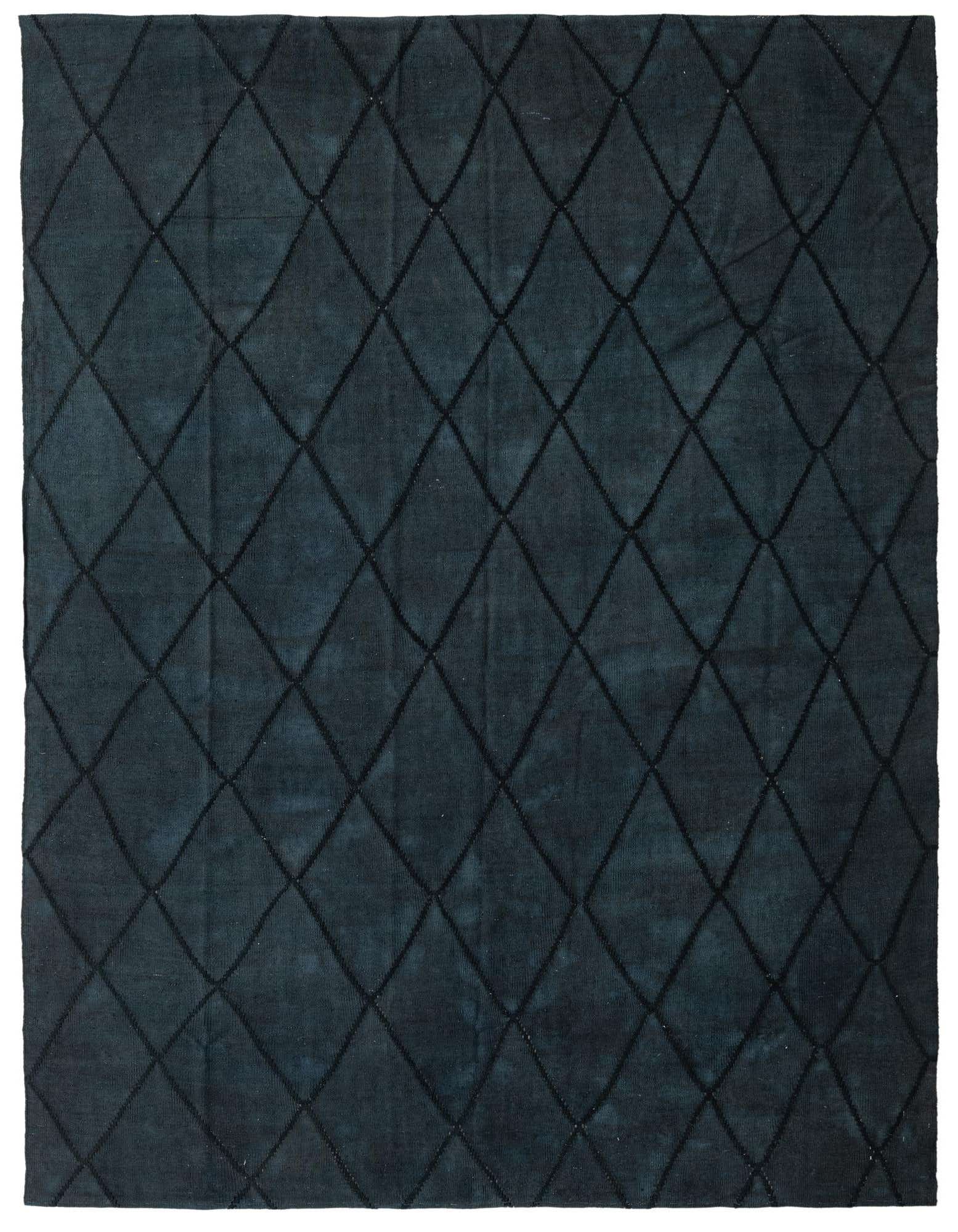 A rectangular 8x10 black wool flatweave rug with a repeating diamond pattern, suitable for a living room.