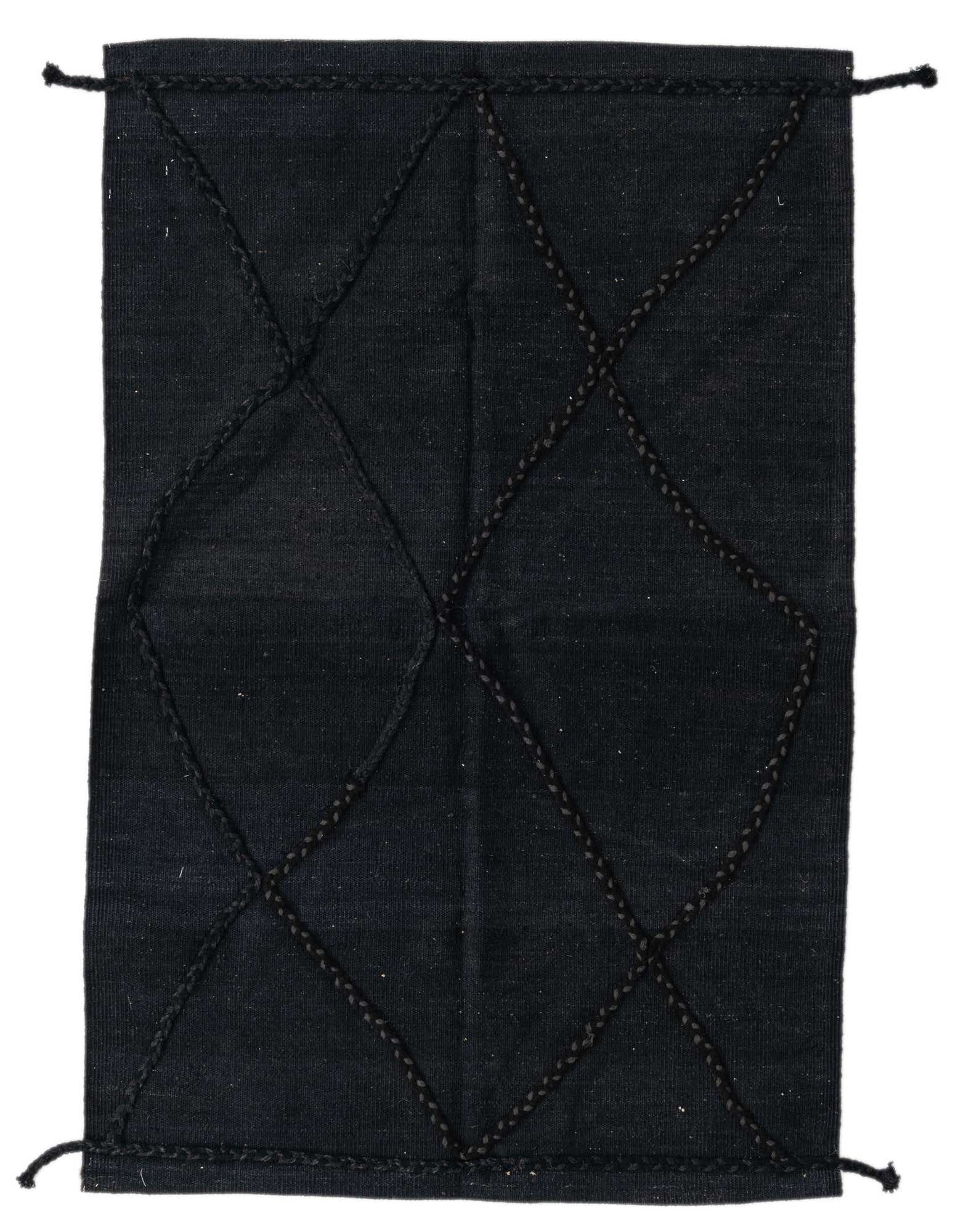A 3x5 rectangular black flatweave rug with a tribal diamond pattern made from braided wool, suitable for an entryway.