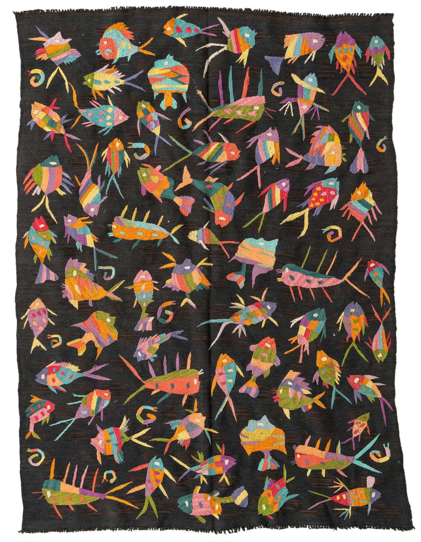 A 4x6 black rectangular Kilim Suzani rug featuring a vibrant, multicolored tribal fish pattern.