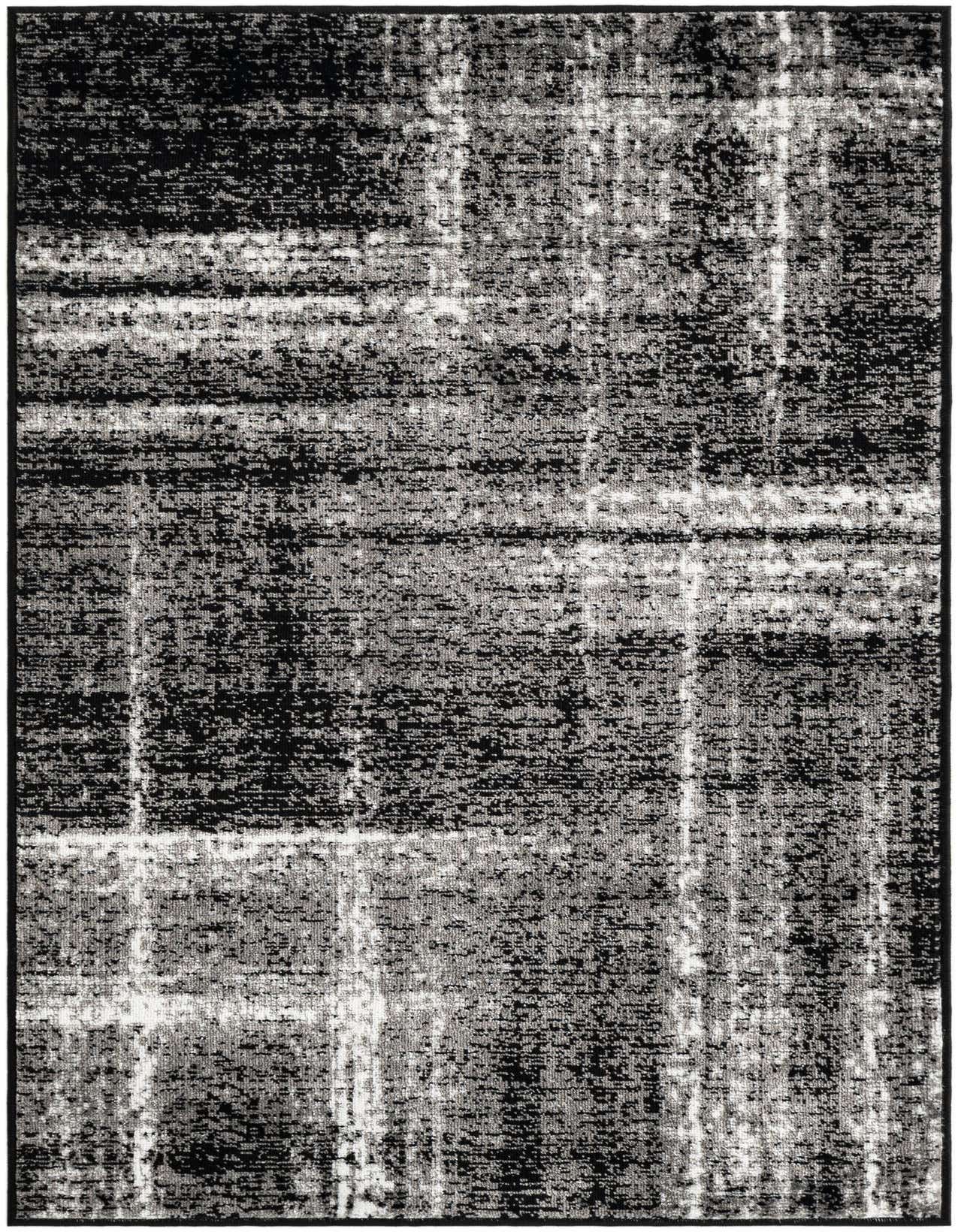 A 3x5 rectangular Rugs.com Laguna rug featuring a distressed abstract pattern in shades of black and dark gray, ideal for an entryway or kitchen.