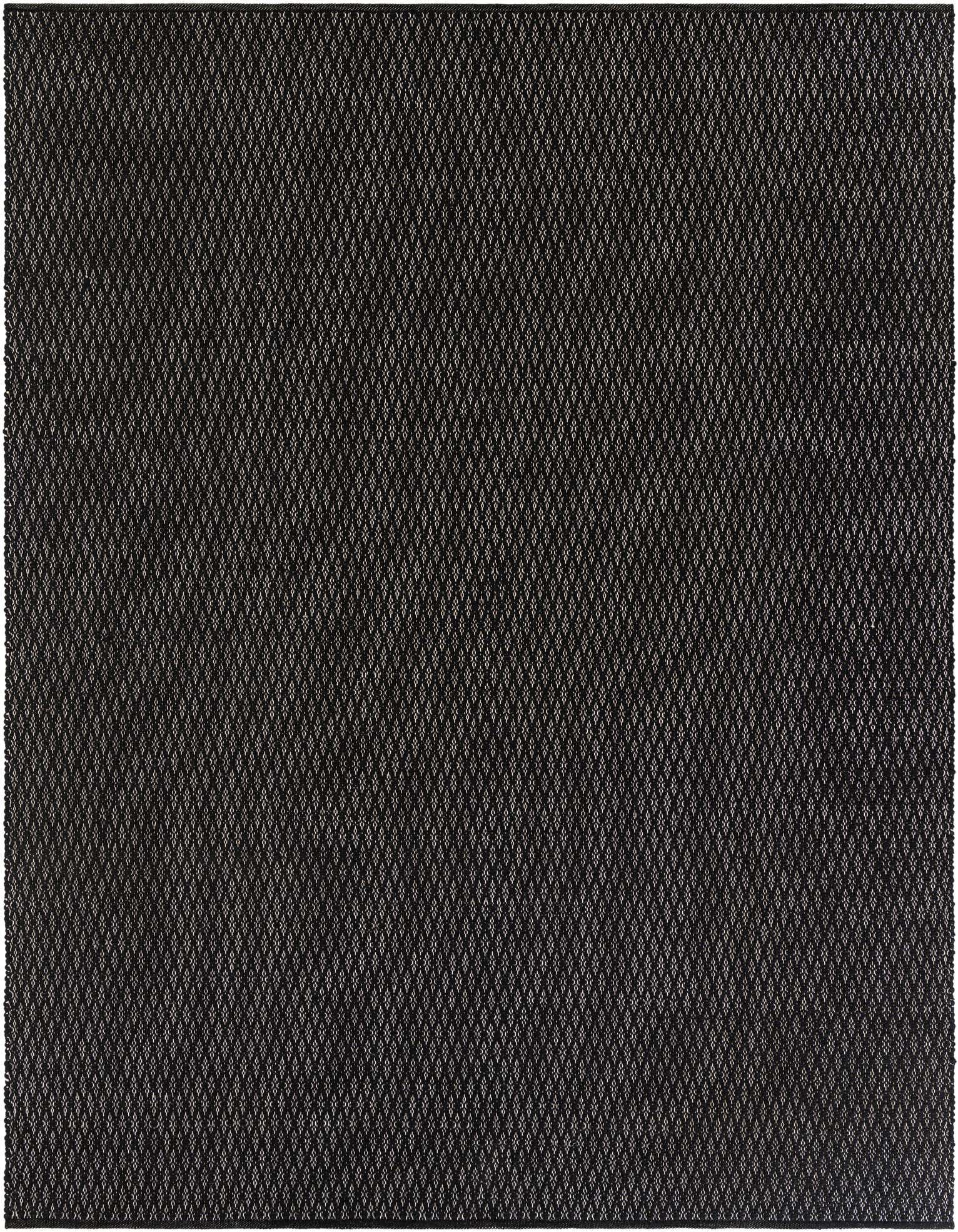 A close-up view of an 8x10 rectangular black area rug with a subtle, textured diamond pattern.