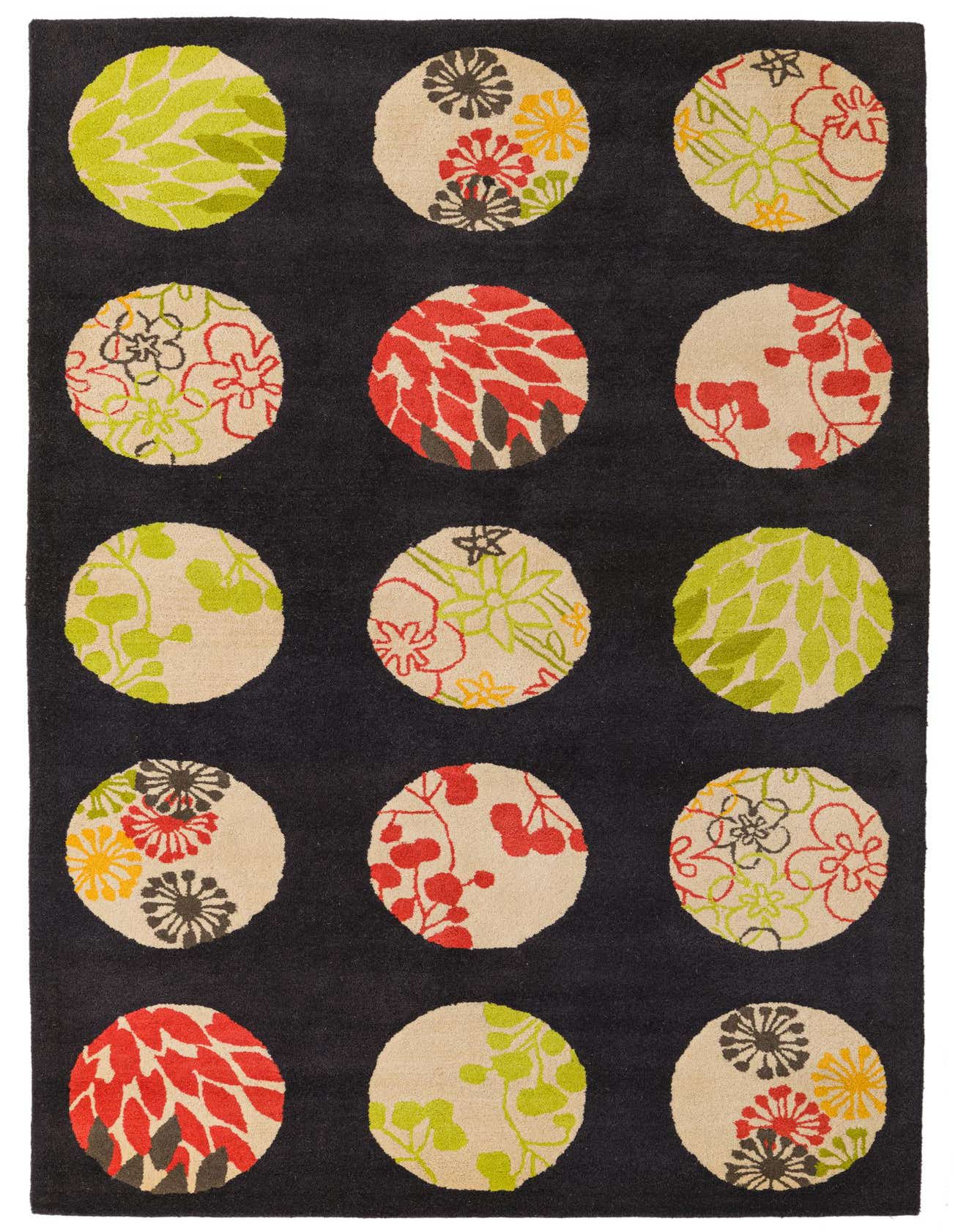 A 5x8 rectangular black area rug with large, colorful modern abstract circles featuring floral and leaf patterns in red, green, and yellow.