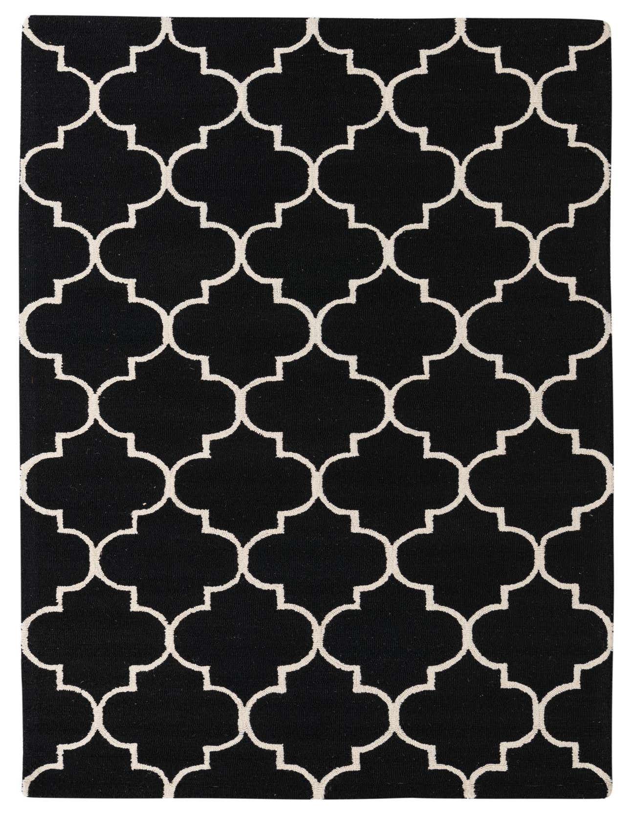 A 5x8 rectangular black wool rug with a repeating modern white quatrefoil pattern, ideal for a living room.