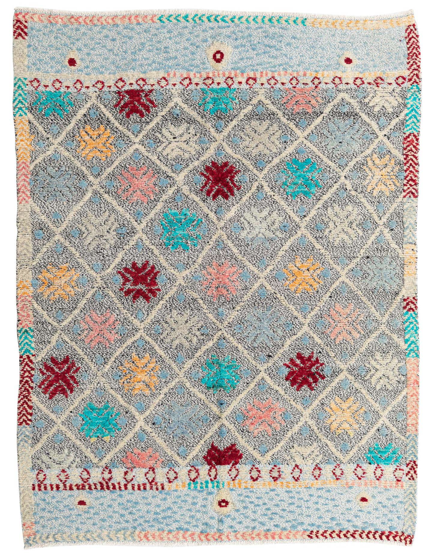 A 6x9 rectangular Modern Ziegler rug featuring a black and white diamond pattern with colorful floral motifs in red, pink, yellow, and teal.