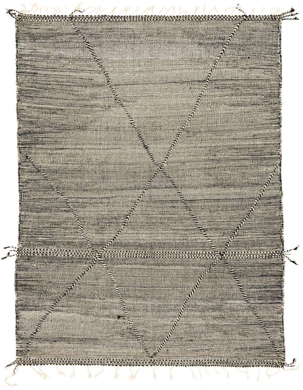 A 10x13 rectangular black and off-white wool shag rug with a modern tribal crisscross pattern.