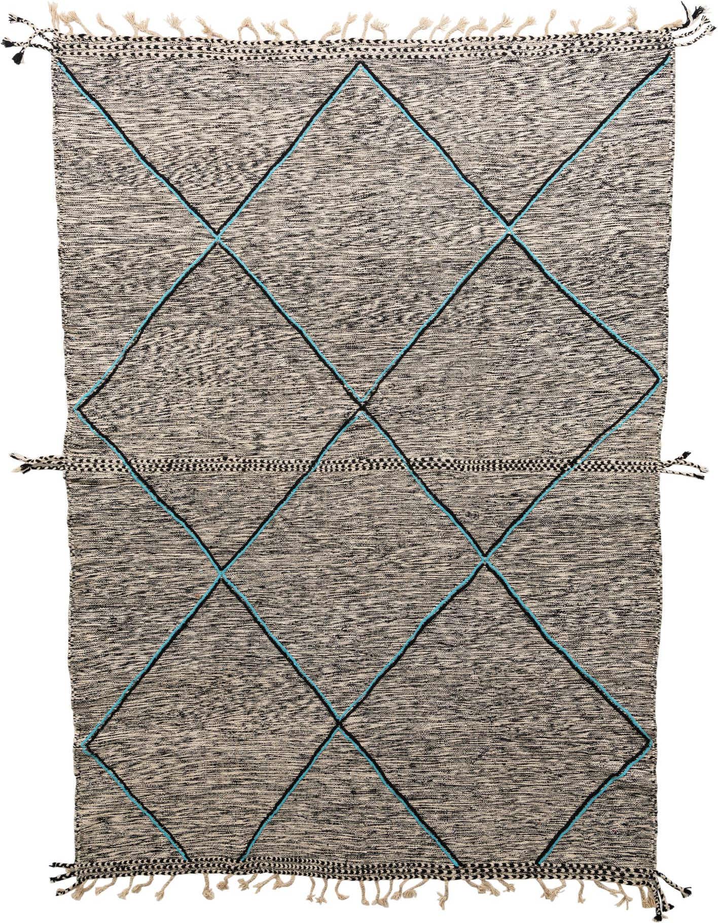A 10x14 rectangular black and off-white wool shag rug with a modern tribal diamond pattern in black and teal, featuring decorative tassels.
