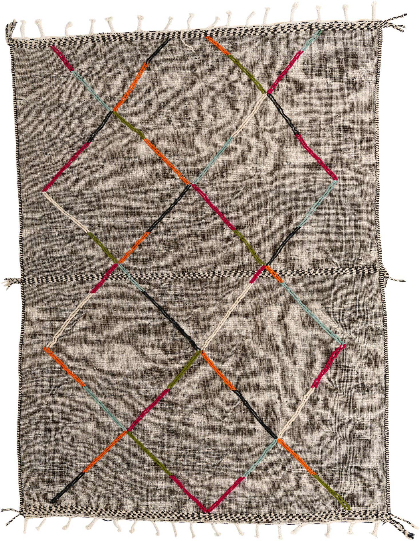 A rectangular 8x12 black wool shag rug with a colorful tribal diamond pattern and fringe.