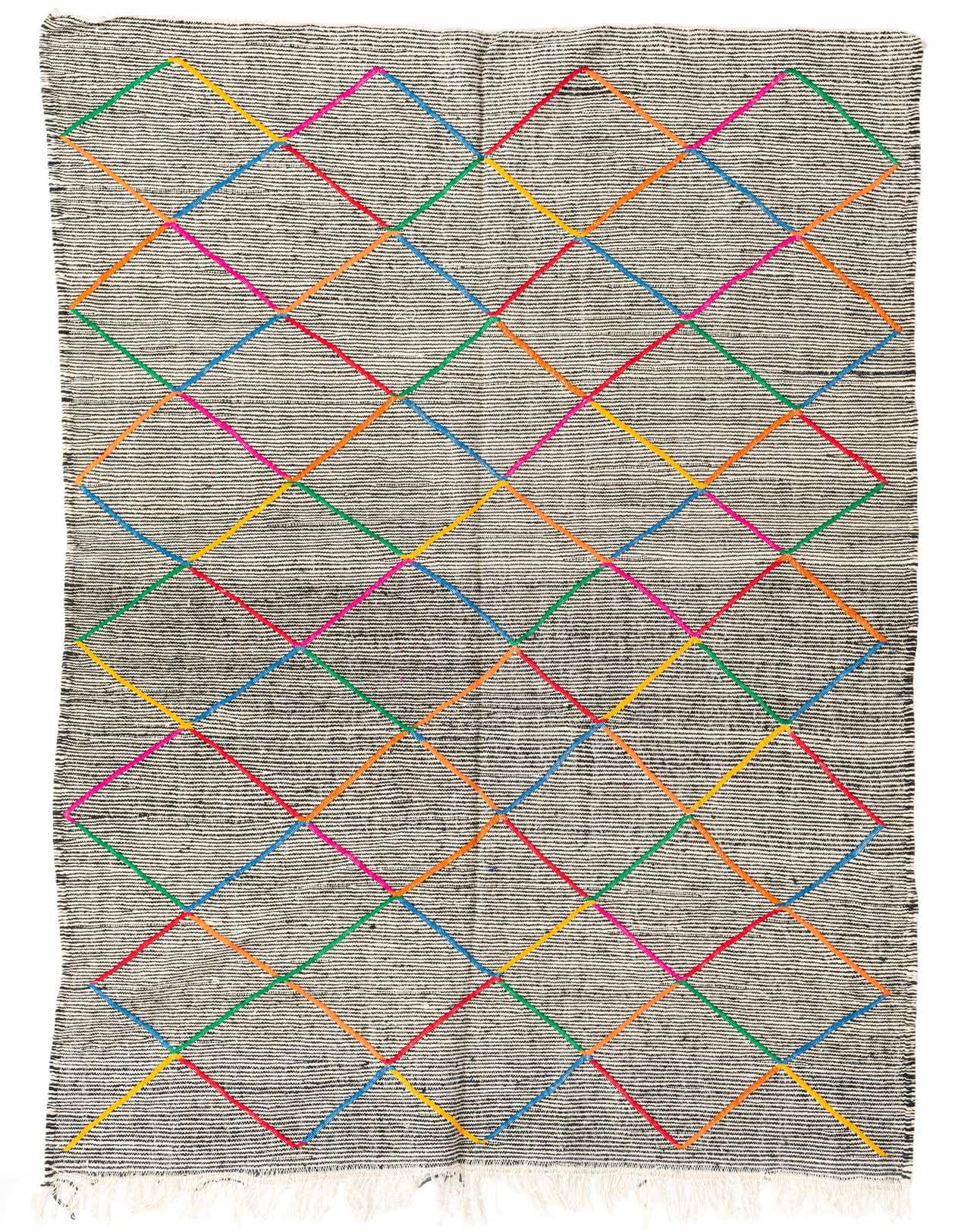 A 5x8 rectangular black and white tribal shag rug with a colorful diamond pattern, suitable for a living room.