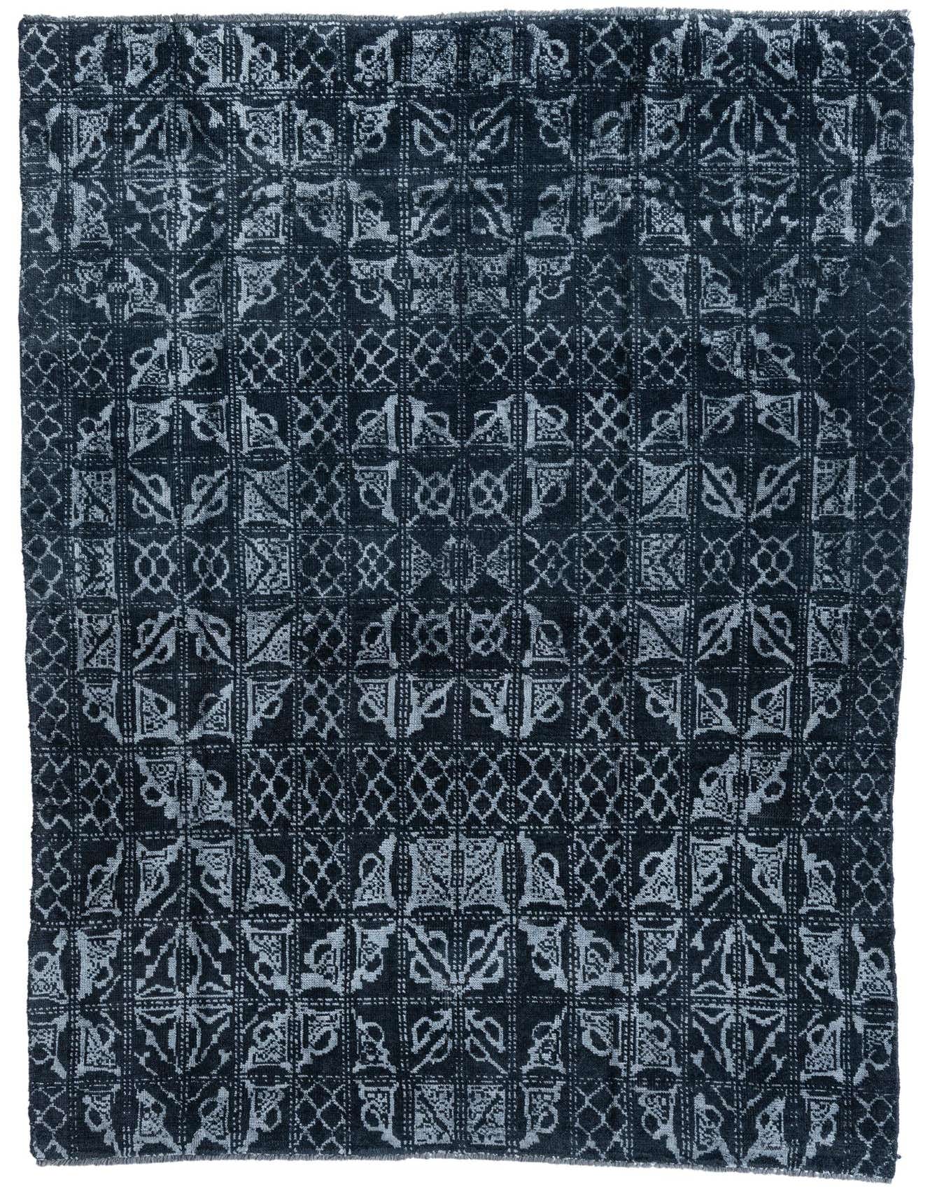 A 6x9 rectangular black wool and silk shag rug with a modern tribal pattern in varying shades of black and grey.