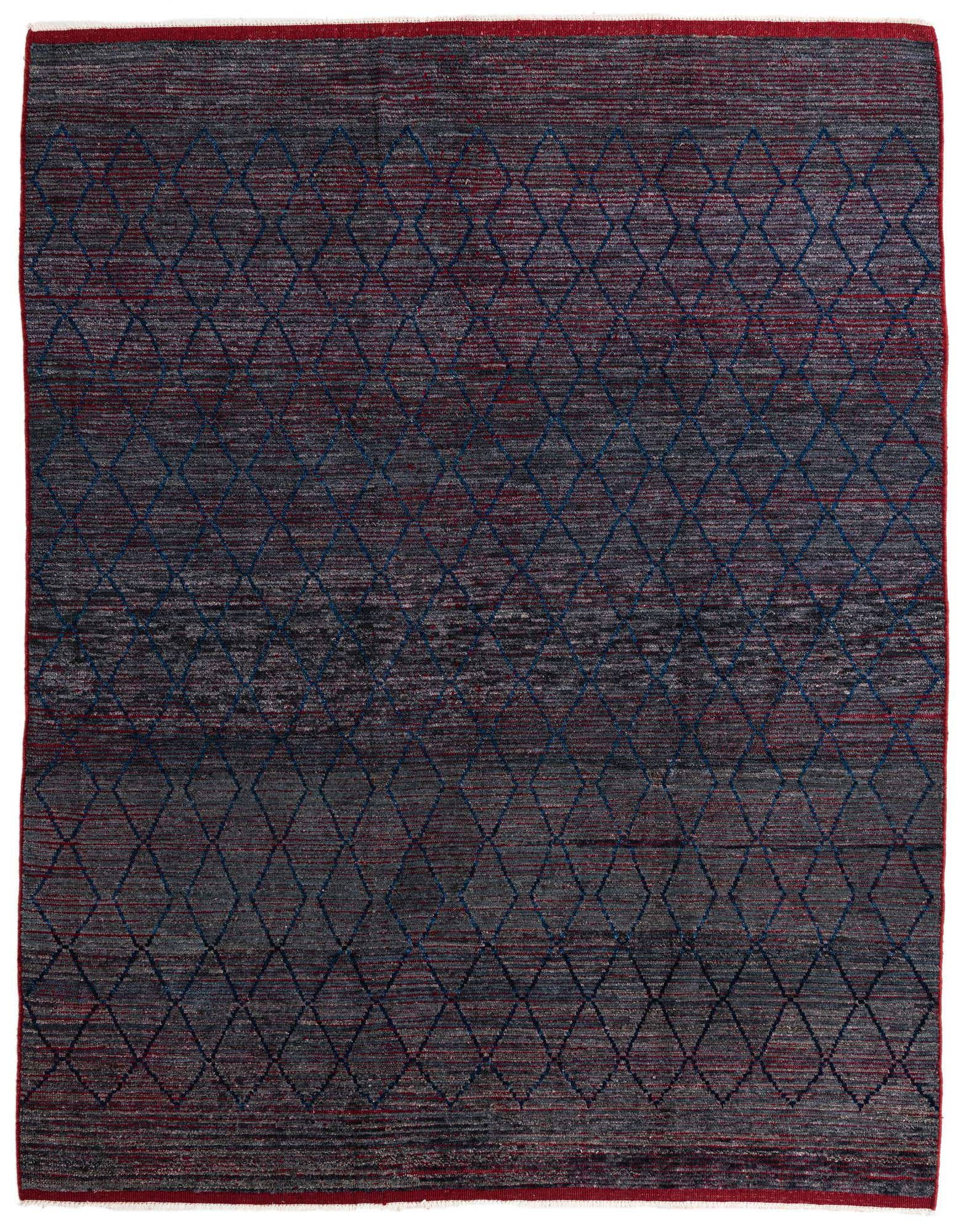 An 8x10 rectangular black wool shag rug with a subtle tribal diamond pattern in blue and red, suitable for a living room.