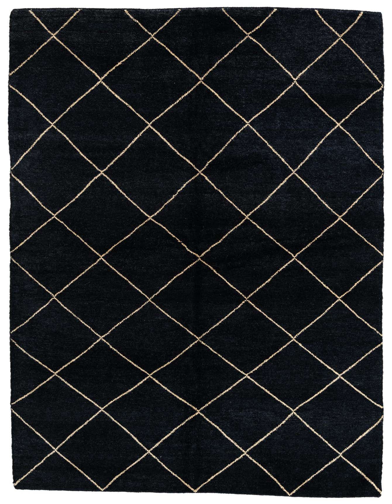 A 6x9 rectangular black shag rug with a cream diamond trellis pattern, perfect for a living room.