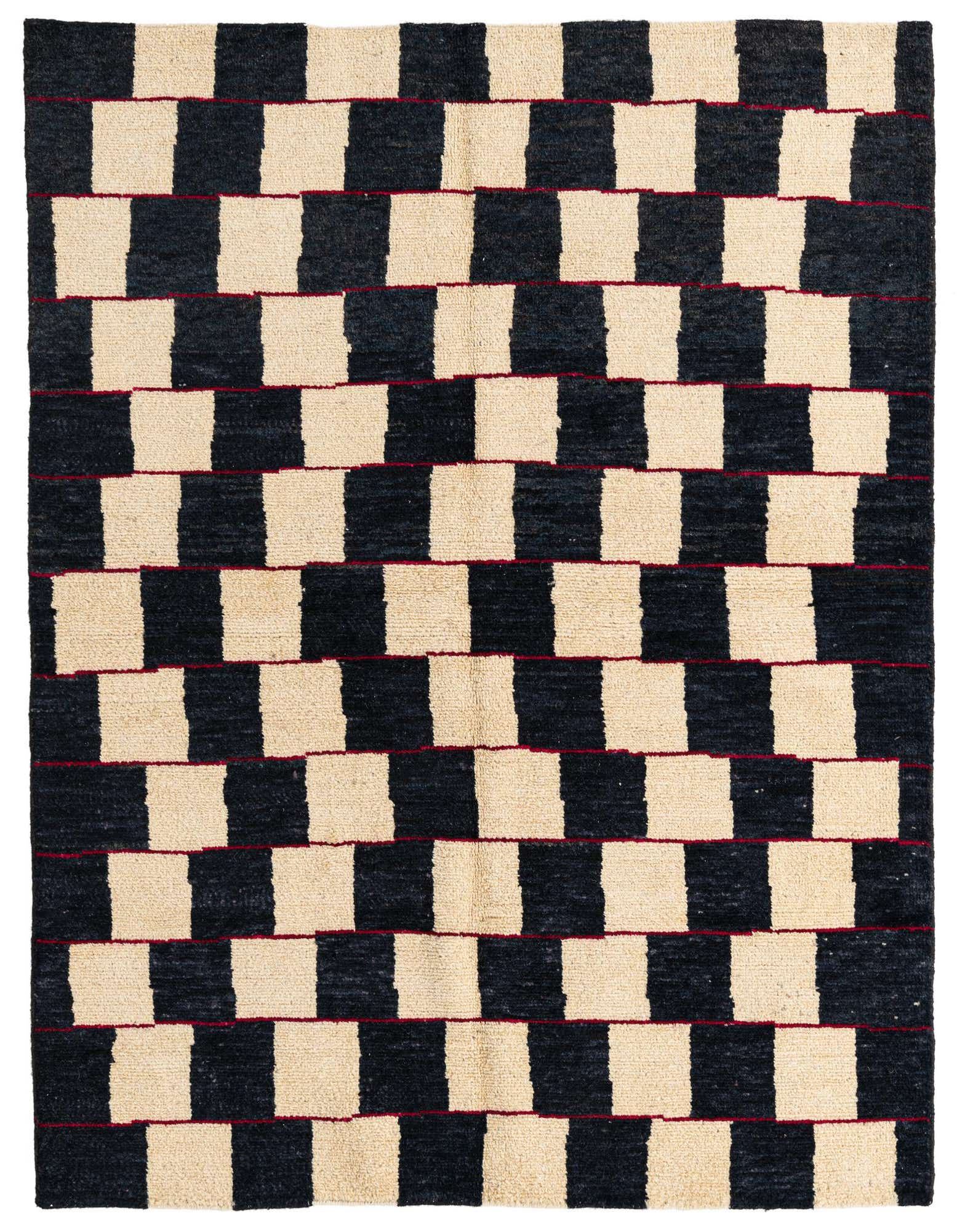 A 5x8 rectangular black and cream shag rug with a bold, modern checkerboard pattern and thin red lines.
