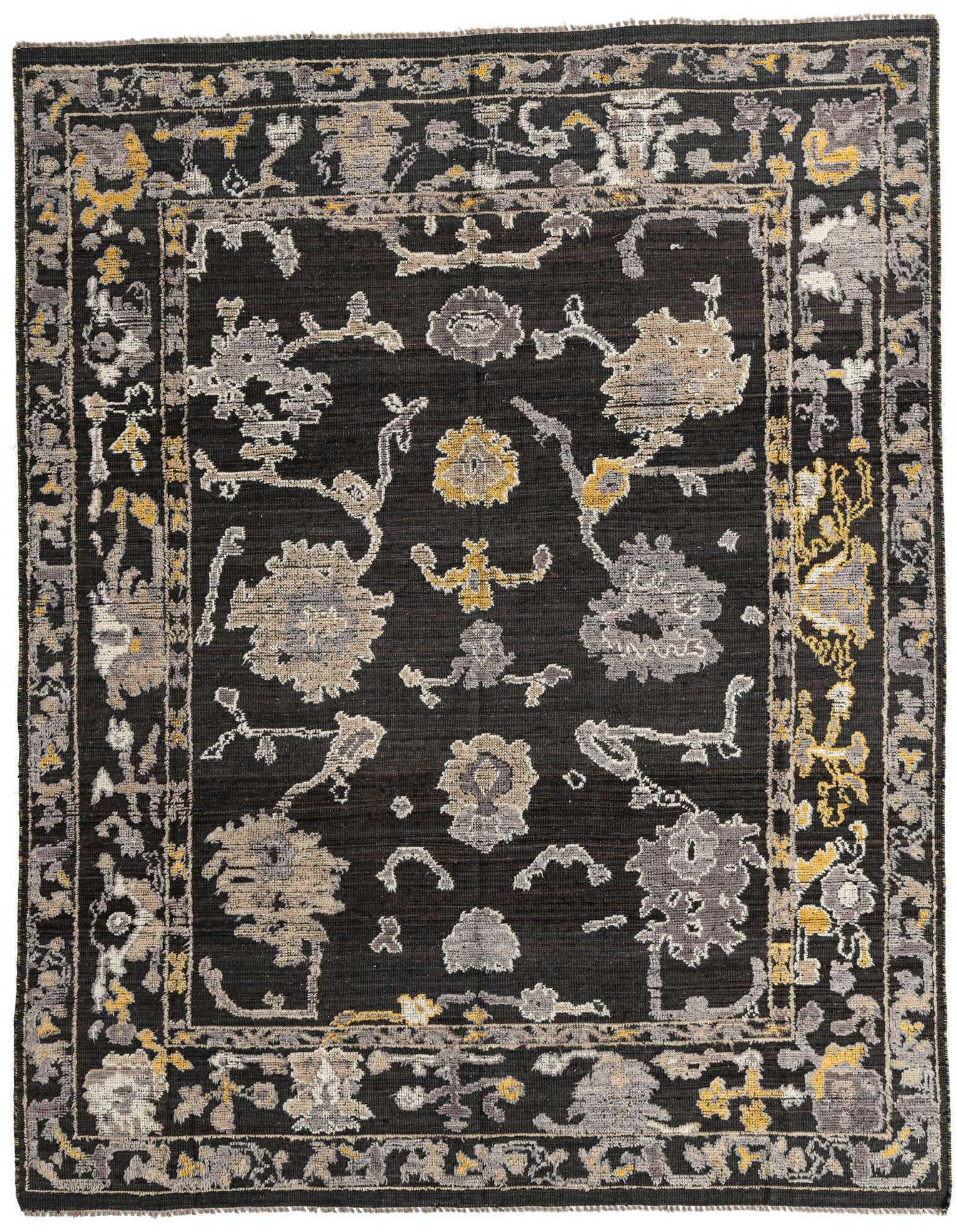 An 8x10 rectangular black wool rug with a tribal modern pattern in gray, beige, and yellow.