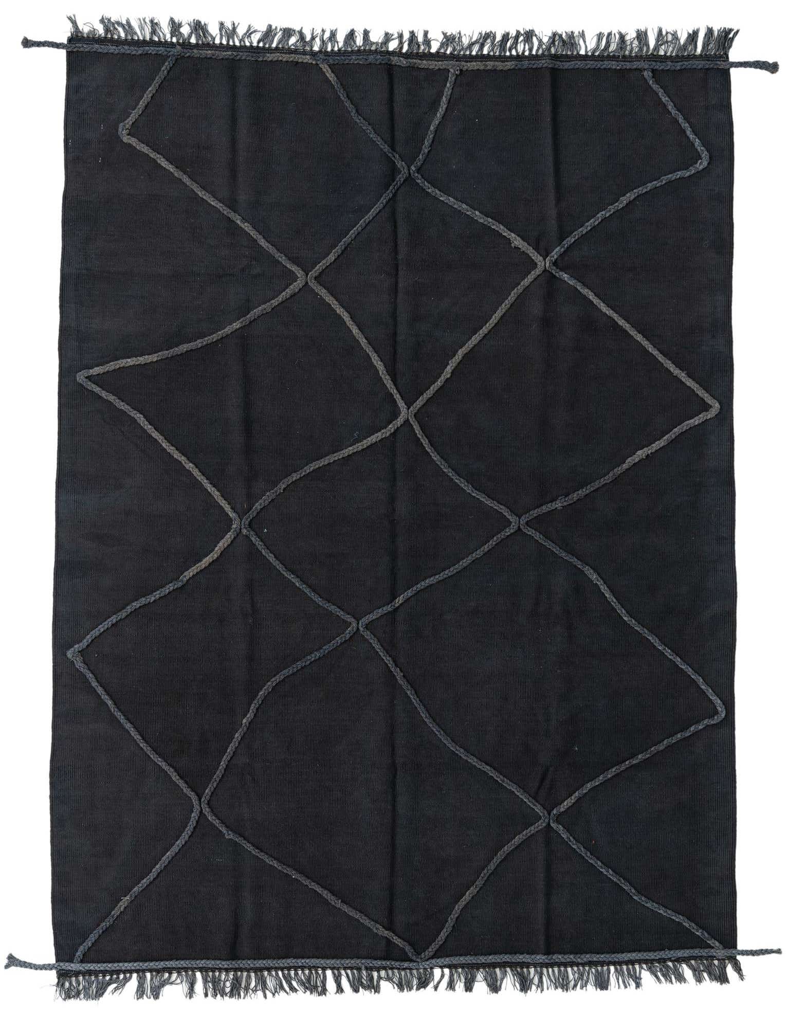 A 5x8 rectangular black shag rug with a modern tribal diamond pattern made from braided wool, featuring fringe.