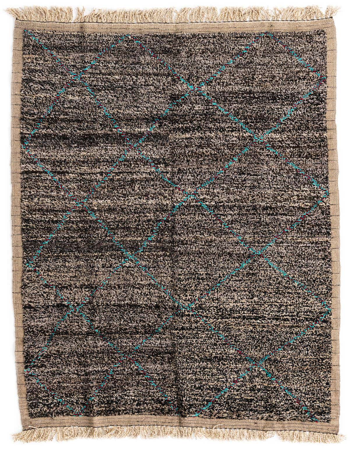 A 5x8 rectangular black shag rug with a subtle tribal diamond pattern in turquoise and red, featuring natural fringed edges.
