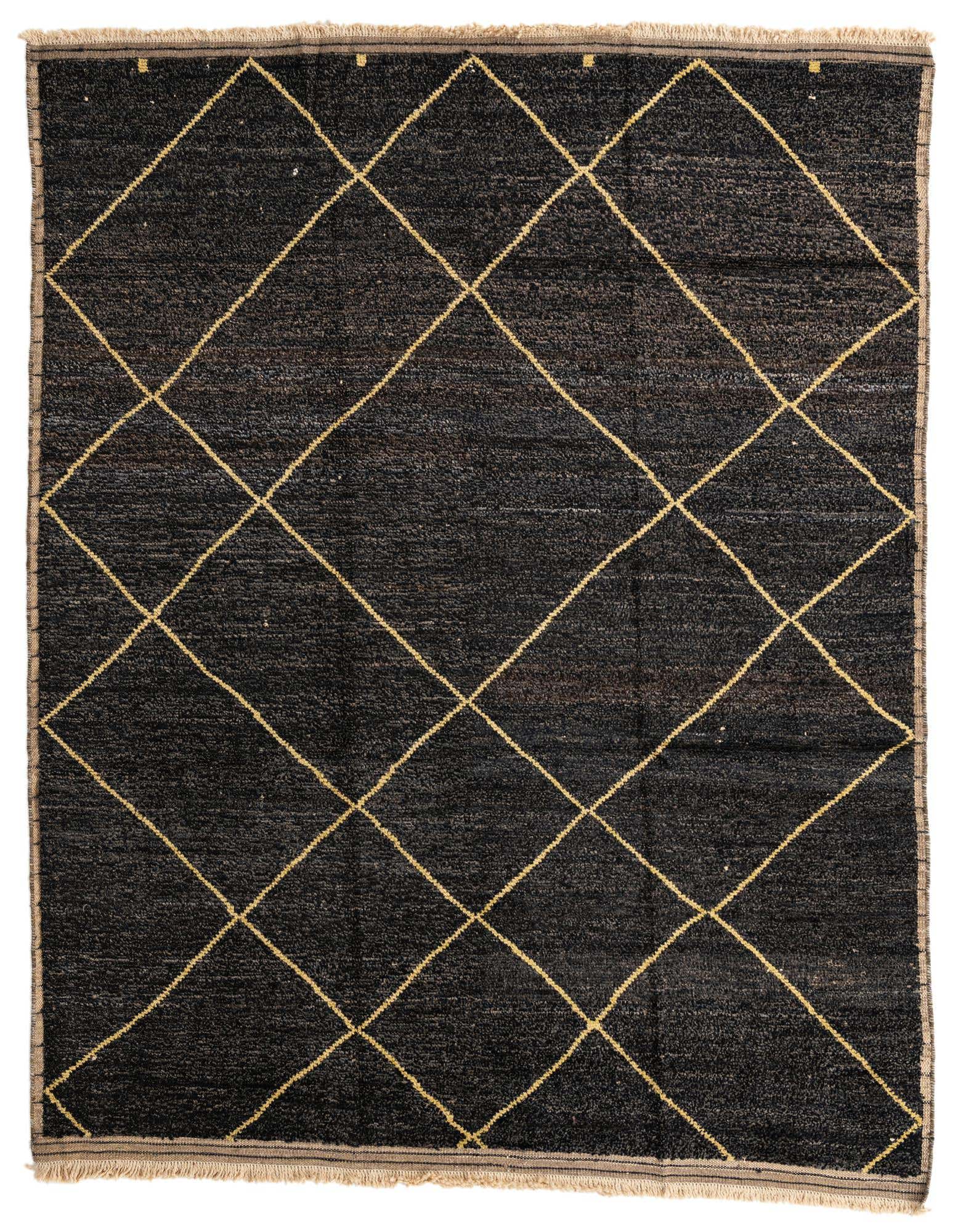 A rectangular 8x10 black shag rug with a yellow tribal diamond pattern and fringed edges, suitable for a living room.