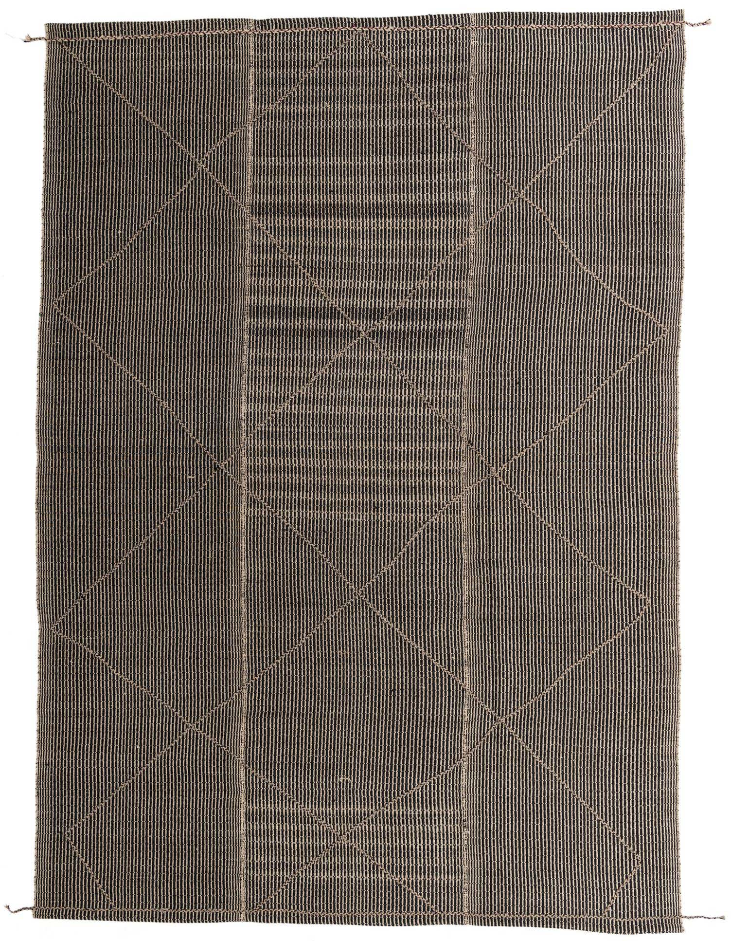 A 10x14 rectangular black shag rug with subtle vertical stripes and a light tribal diamond pattern.