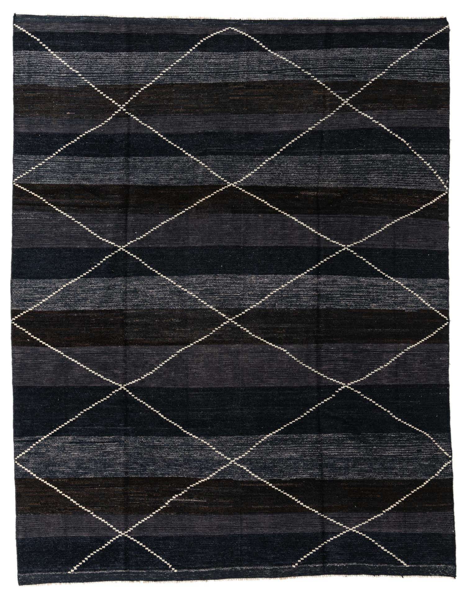 A rectangular 8x10 black wool shag rug with varying horizontal black stripes and a white diamond lattice pattern.
