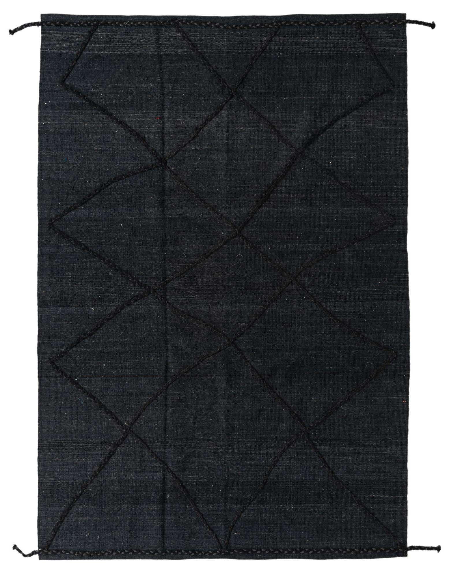 A 5x8 rectangular black wool shag rug with a tribal diamond pattern, ideal for a modern living room.