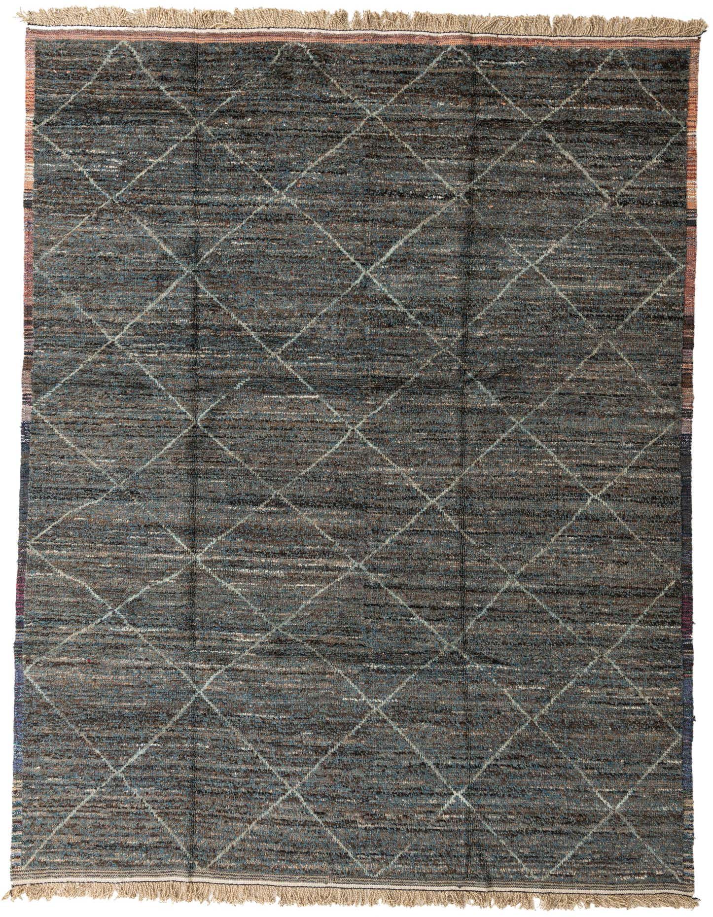 A 10x13 rectangular black wool shag rug with a subtle tribal diamond pattern and fringe.