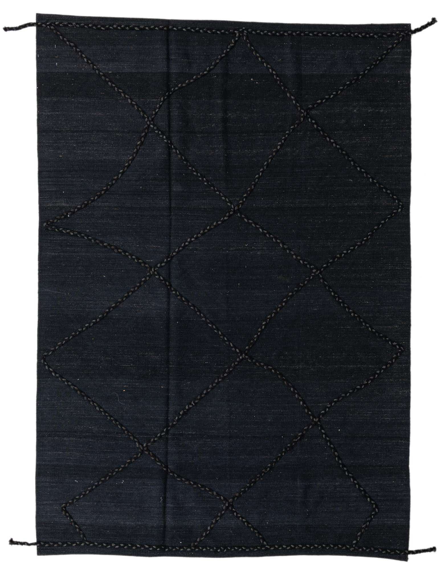 A 5x8 rectangular black wool shag rug with a textured tribal diamond pattern, ideal for a living room or bedroom.