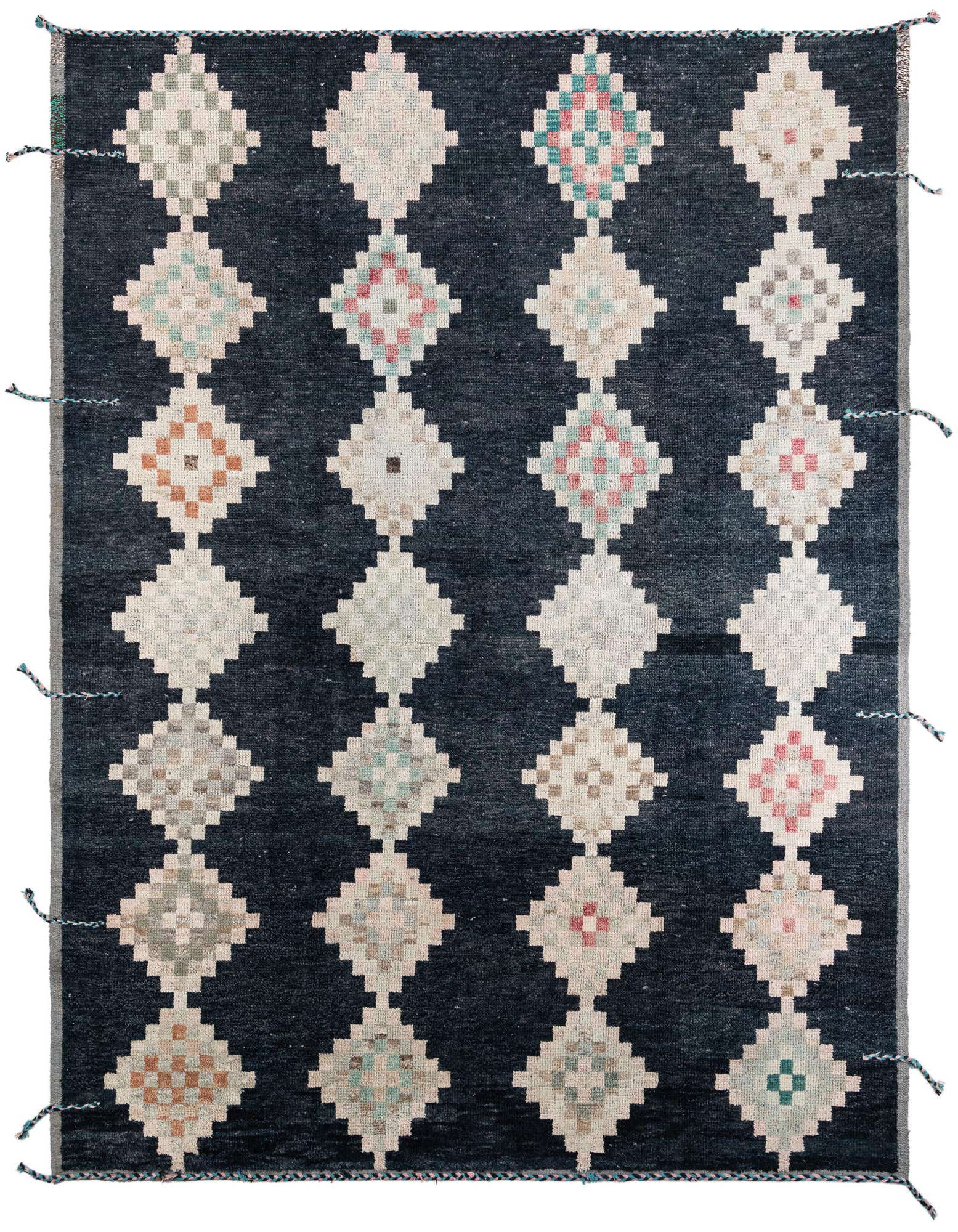 A 9x12 rectangular black wool shag rug with a repeating pattern of light-colored tribal diamond motifs.