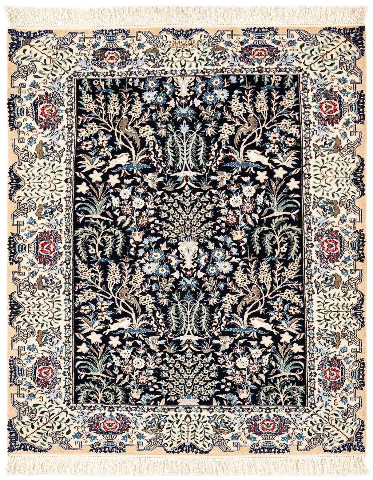 A handmade rectangular Persian rug with a black field, intricate floral and bird motifs, and a cream border.