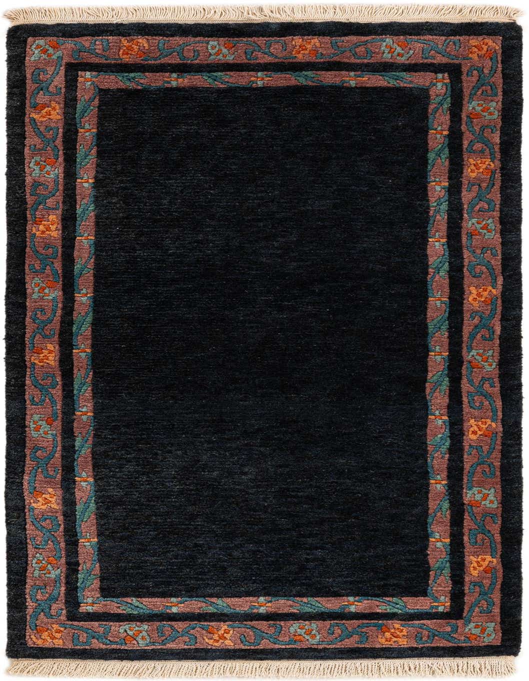 A 3x5 rectangular black wool rug with a detailed oriental border featuring orange flowers and teal vines, suitable for indoor use.