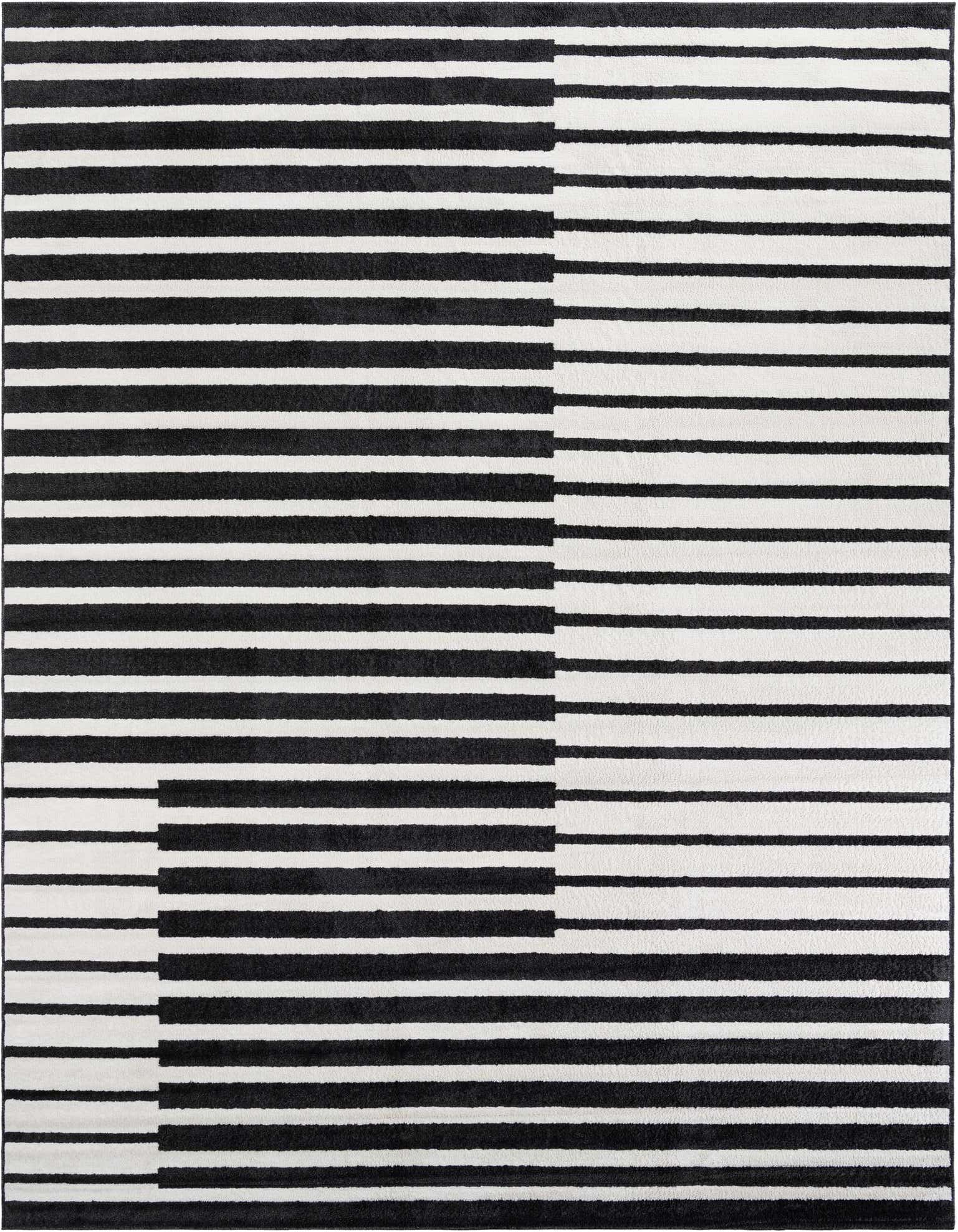 A 10x13 rectangular Oslo rug with a modern black and white striped geometric pattern, ideal for a living room.