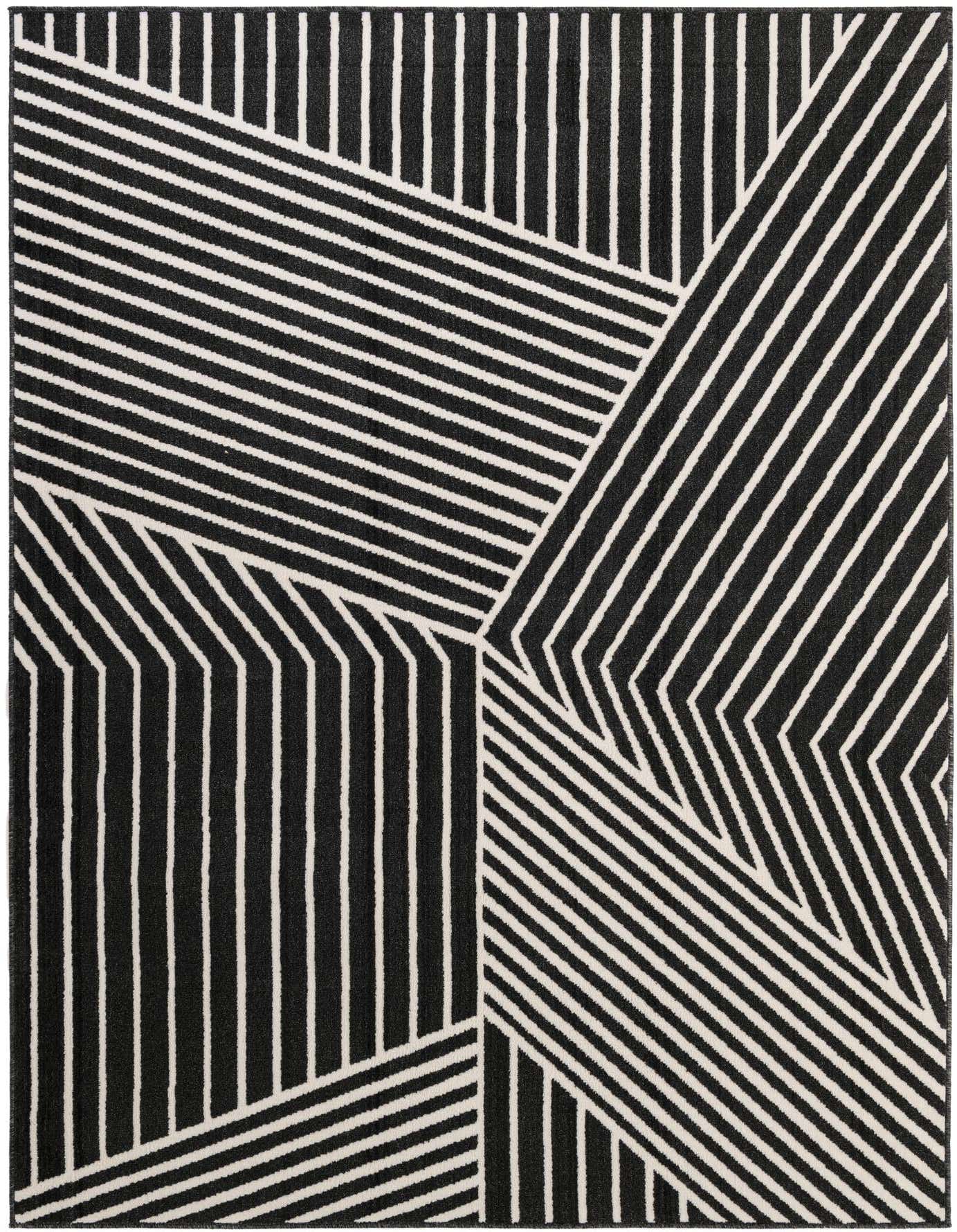 A 7x10 rectangular black and white modern rug with bold geometric stripes in varying directions.