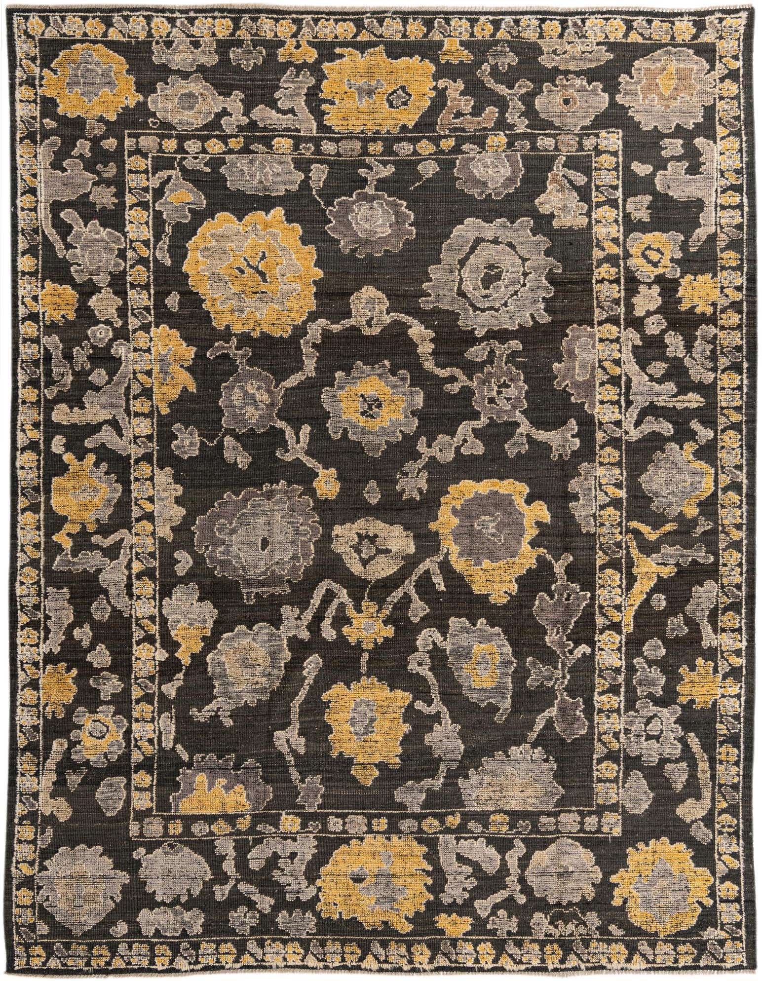 A 9x12 rectangular Oushak rug with a black background and abstract floral patterns in gold and gray.