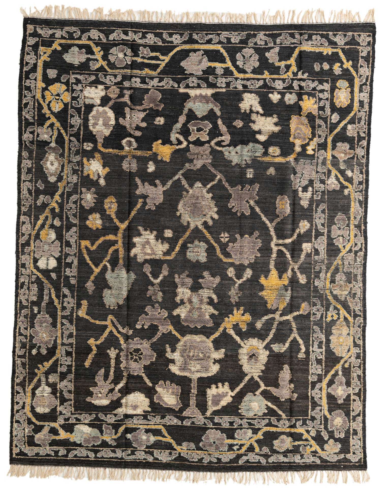 An 8x10 rectangular Oushak rug in black, featuring a modern abstract floral pattern with gray, cream, and yellow accents.