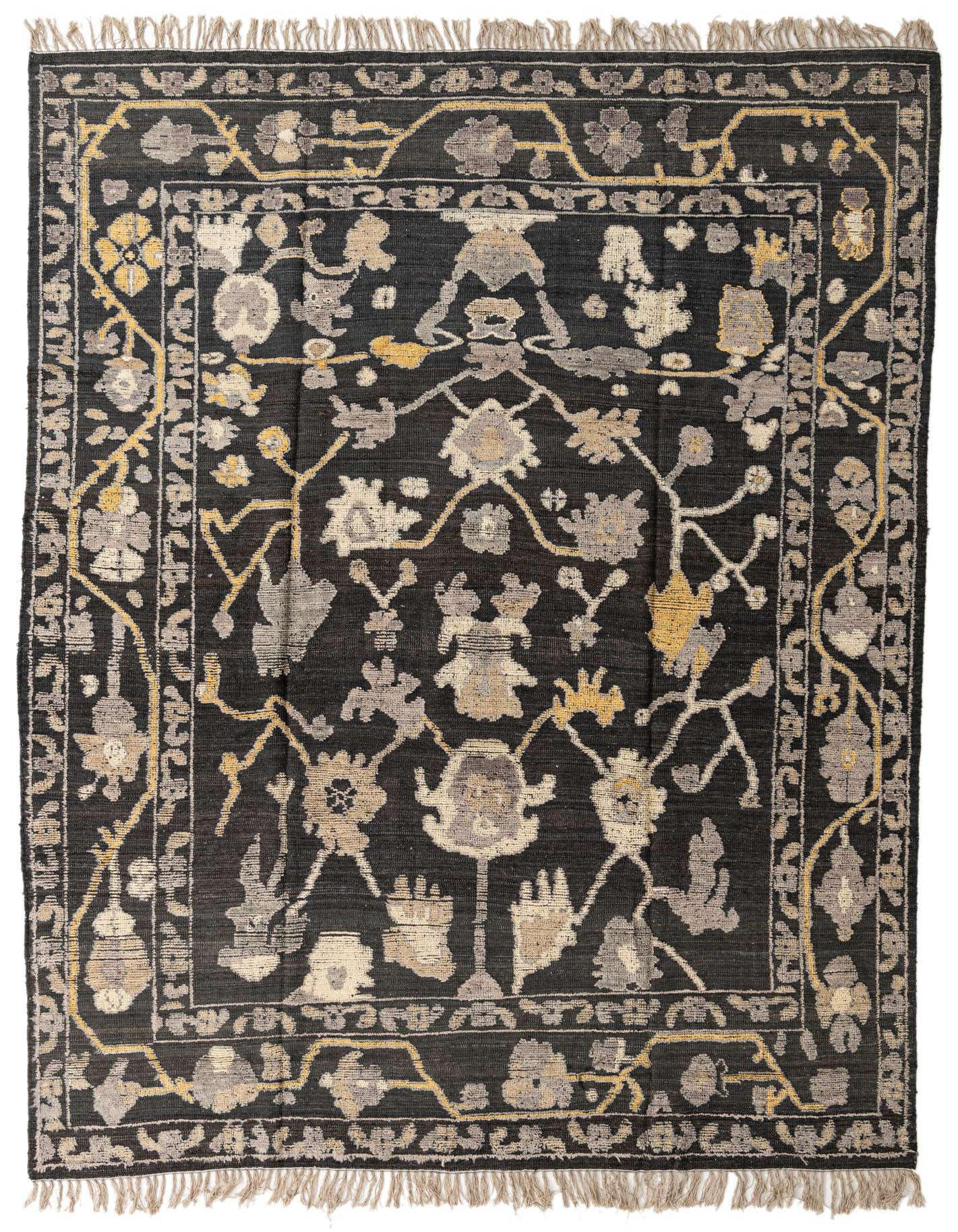 A 9x12 rectangular Oushak rug in black with a modern abstract pattern in grey, beige, and yellow, featuring short fringes.