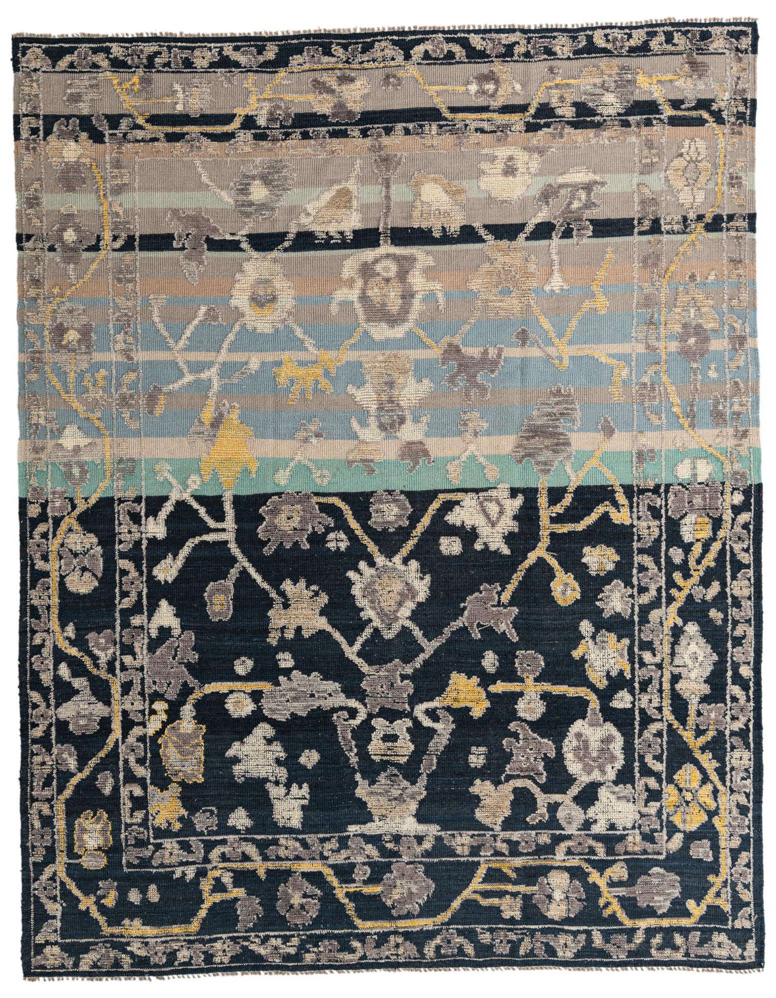 A rectangular 8x10 modern wool rug featuring a split design with a dark black floral pattern on the bottom half and a striped top half in muted grays, blues, and tans, accented with yellow.