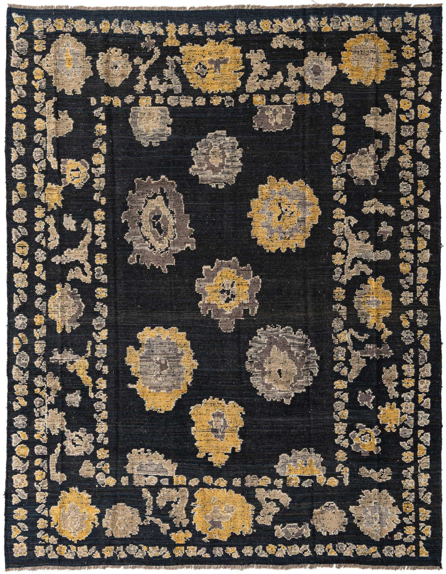 A rectangular 8x10 black wool rug with a modern floral pattern in shades of gold and beige, featuring a decorative border.