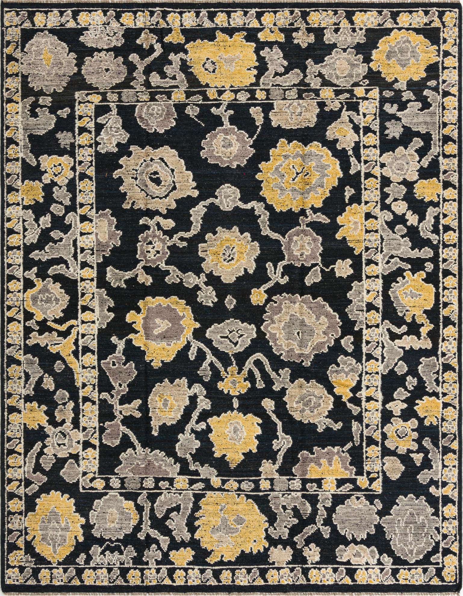 A rectangular 8x10 black wool rug featuring a modern abstract floral pattern in yellow, grey, and beige tones.