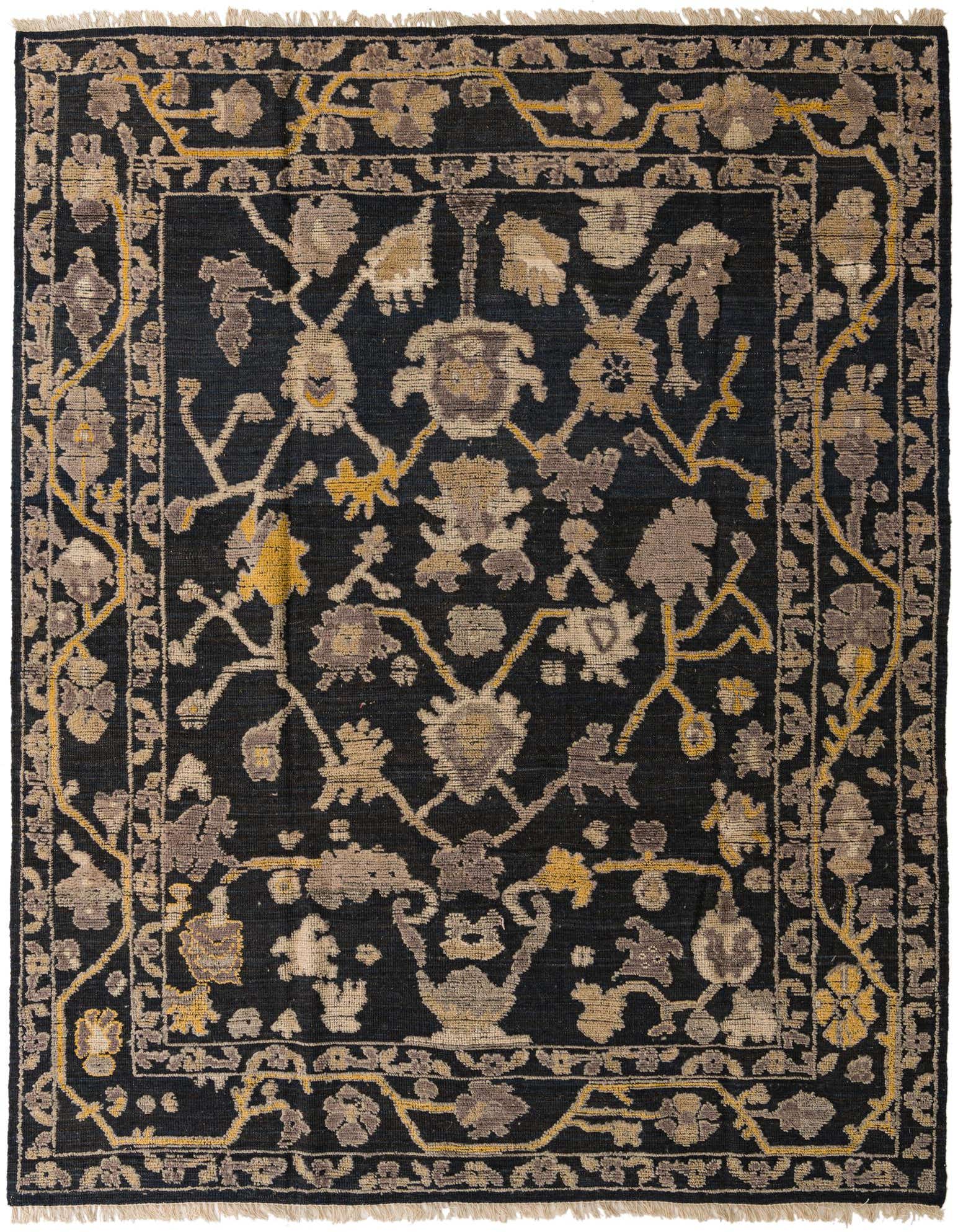 A handmade 8x10 rectangular Oushak rug in black wool, featuring a modern floral pattern with gold and grey accents.