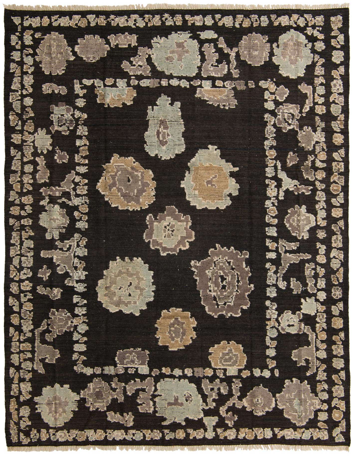 A 9x12 rectangular black wool rug with an abstract modern pattern of light blue, brown, and grey floral shapes.