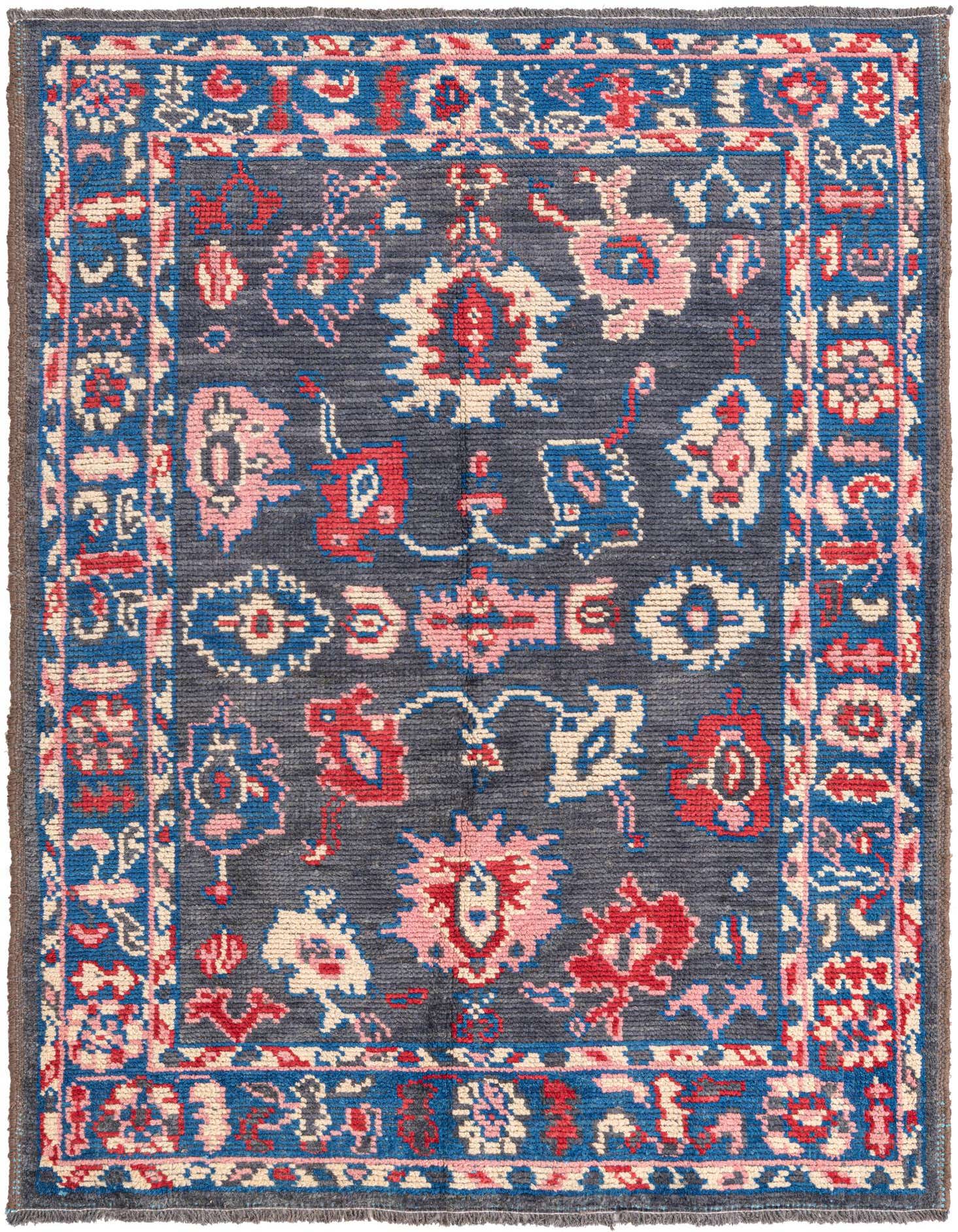 A 5x8 rectangular black Oushak rug with a modern pattern featuring red, blue, and pink floral motifs and a blue border.