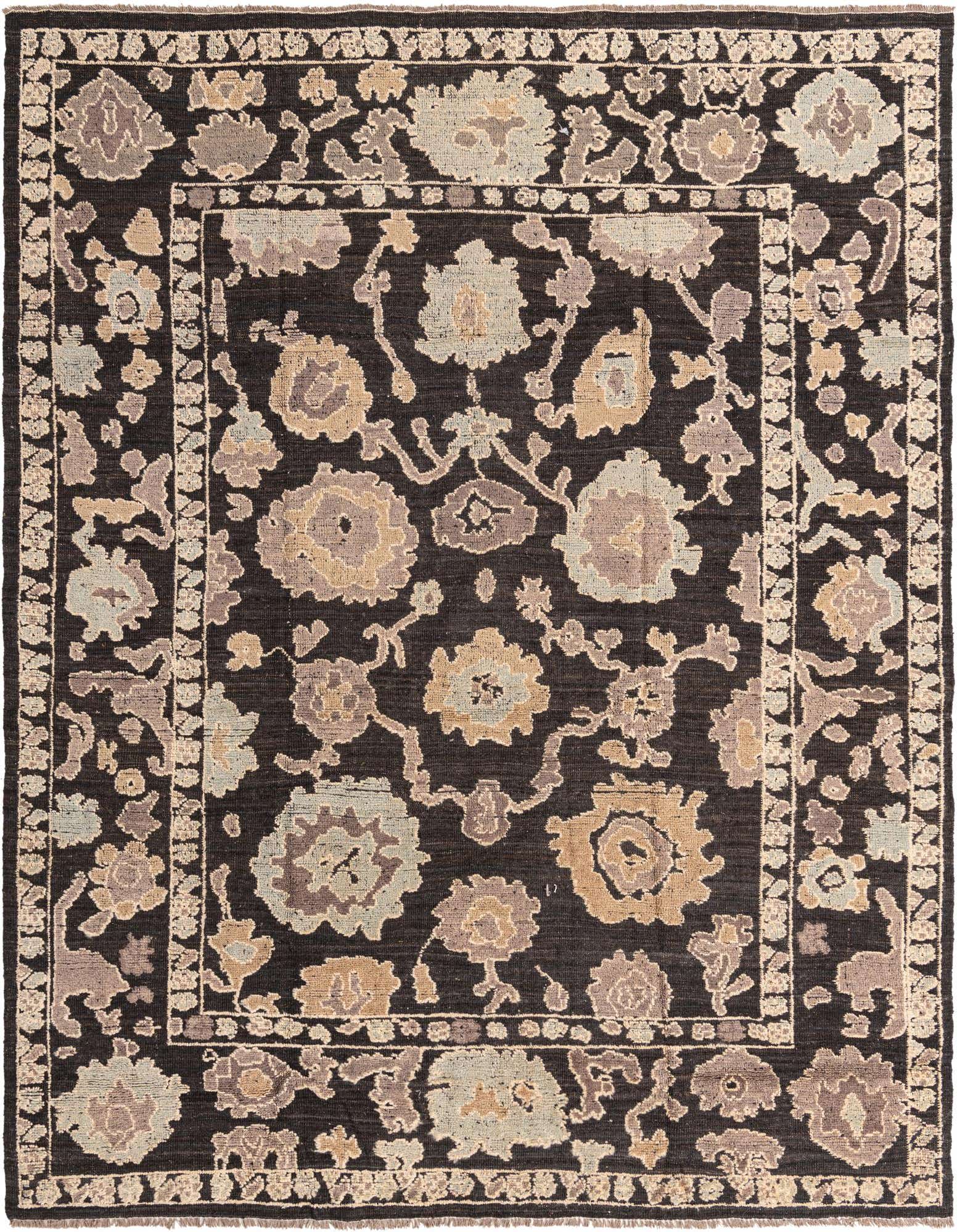 A 9x12 rectangular black wool rug with a modern Oushak floral pattern in shades of beige, grey, and light blue.