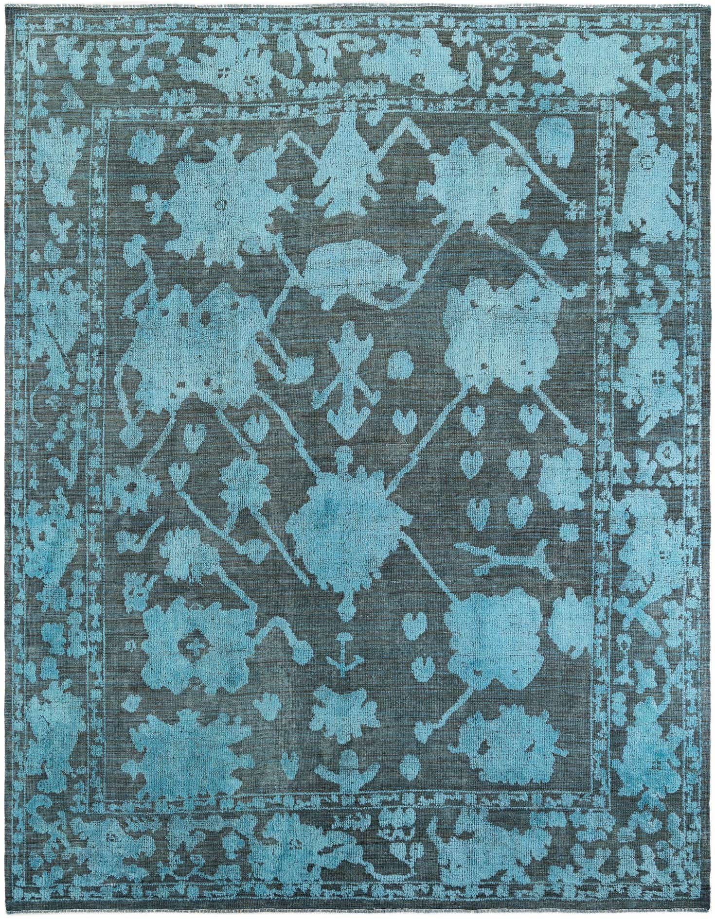 A 9x12 rectangular Oushak rug in black and light blue, featuring a modern floral pattern with a distinct border.