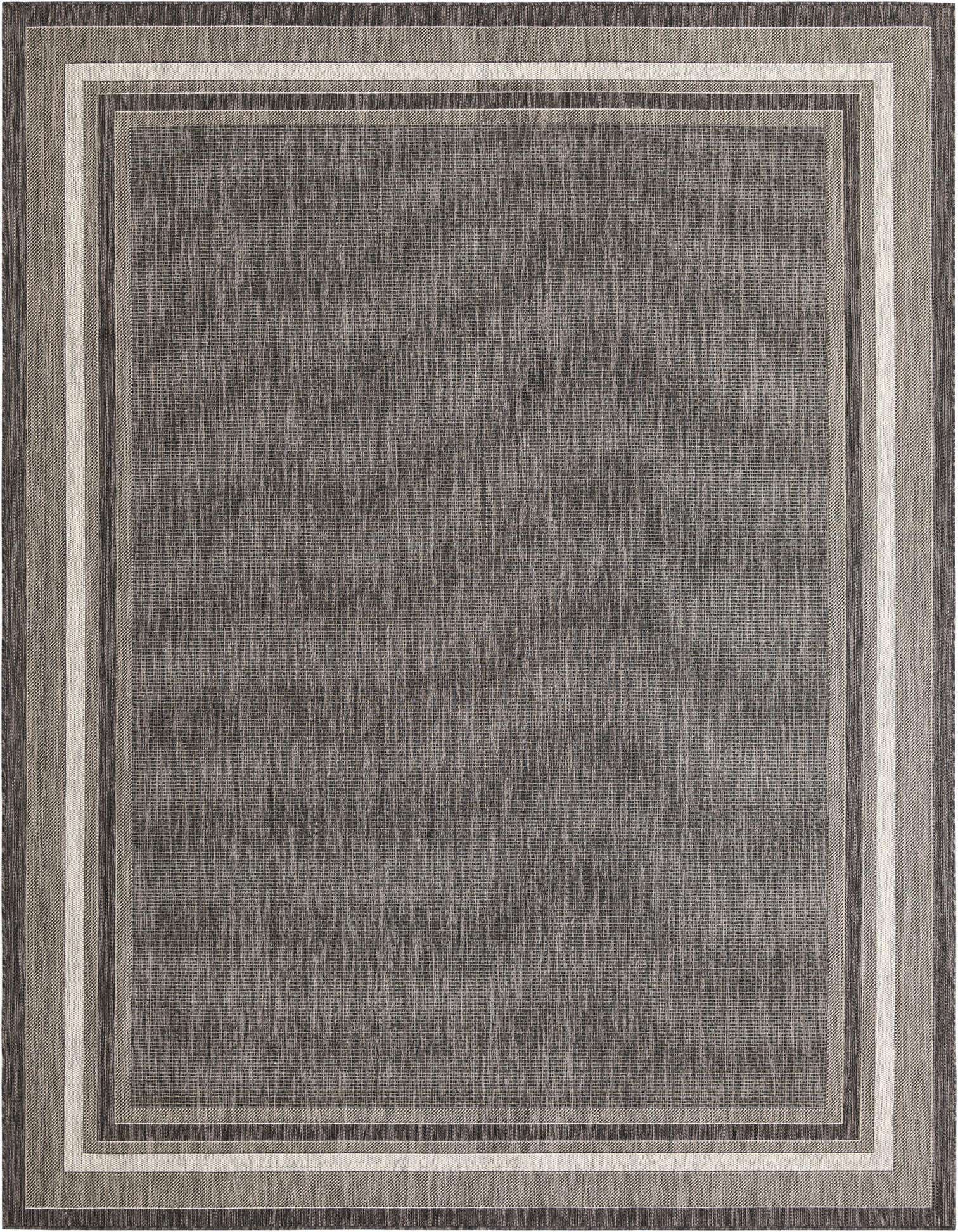 A 9x12 rectangular black indoor/outdoor rug with a subtle border pattern, suitable for a patio or living room.
