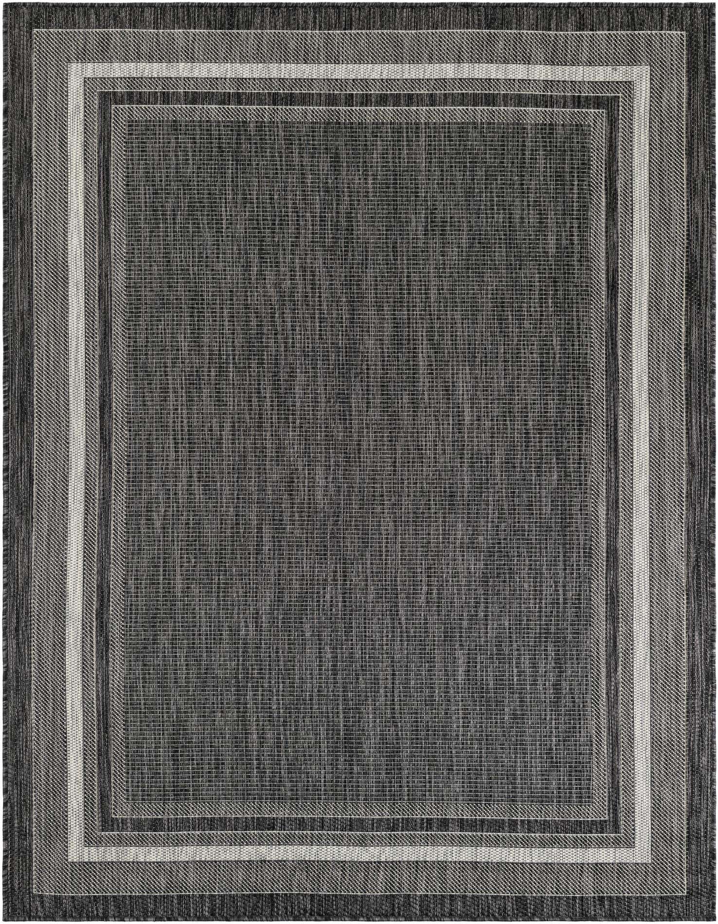 A 5x7 rectangular black modern flatweave rug with a subtle striped border, suitable for indoor or outdoor use.