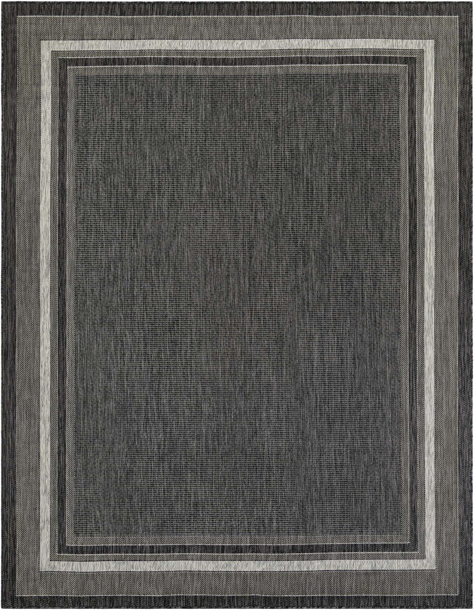 A rectangular 8x10 black modern indoor/outdoor rug with a multi-toned border, ideal for a patio or living room.